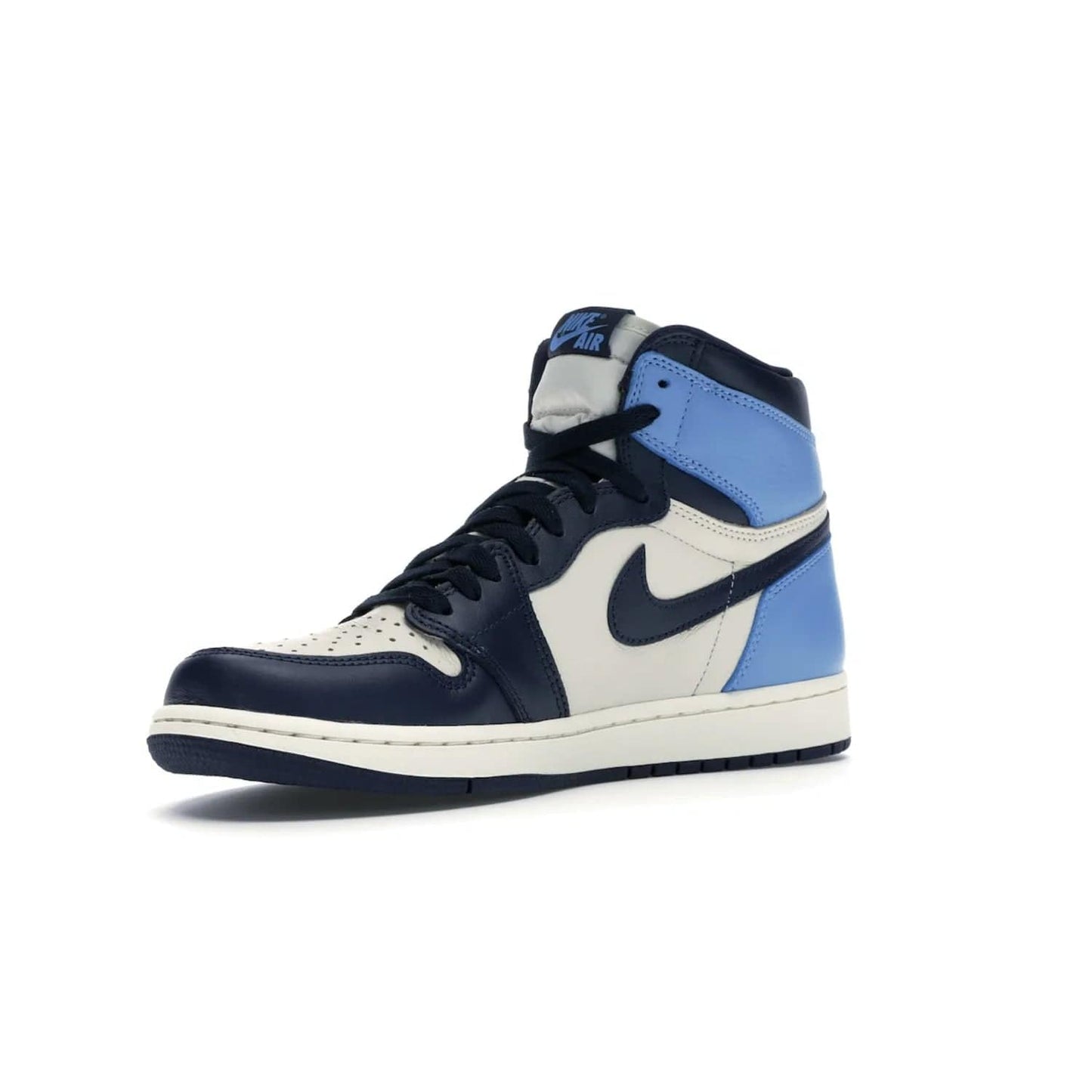 Jordan 1 Retro High Obsidian UNC - Image 15 - Only at www.BallersClubKickz.com - Bring a timeless classic to your wardrobe with the Air Jordan 1 Retro High "Obsidian/University Blue”. A full leather upper combines Obsidian and University Blue detailing for a retro Jordan style. Stitched Jumpman logo pays tribute to UNC. Experience classic style with a timeless sneaker.