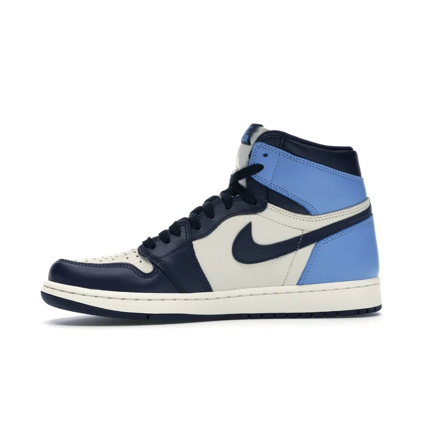 Jordan 1 Retro High Obsidian UNC - Image 18 - Only at www.BallersClubKickz.com - Bring a timeless classic to your wardrobe with the Air Jordan 1 Retro High "Obsidian/University Blue”. A full leather upper combines Obsidian and University Blue detailing for a retro Jordan style. Stitched Jumpman logo pays tribute to UNC. Experience classic style with a timeless sneaker.