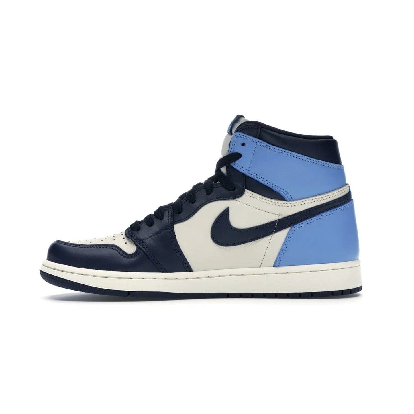 Jordan 1 Retro High Obsidian UNC - Image 19 - Only at www.BallersClubKickz.com - Bring a timeless classic to your wardrobe with the Air Jordan 1 Retro High "Obsidian/University Blue”. A full leather upper combines Obsidian and University Blue detailing for a retro Jordan style. Stitched Jumpman logo pays tribute to UNC. Experience classic style with a timeless sneaker.