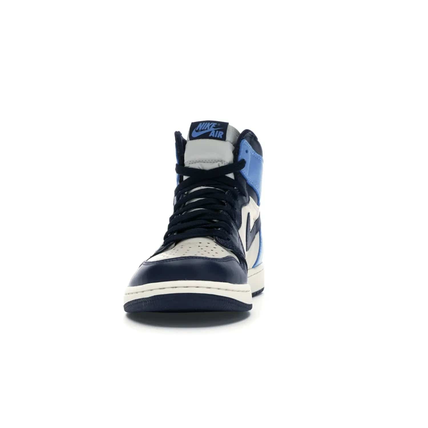 Jordan 1 Retro High Obsidian UNC - Image 11 - Only at www.BallersClubKickz.com - Bring a timeless classic to your wardrobe with the Air Jordan 1 Retro High "Obsidian/University Blue”. A full leather upper combines Obsidian and University Blue detailing for a retro Jordan style. Stitched Jumpman logo pays tribute to UNC. Experience classic style with a timeless sneaker.