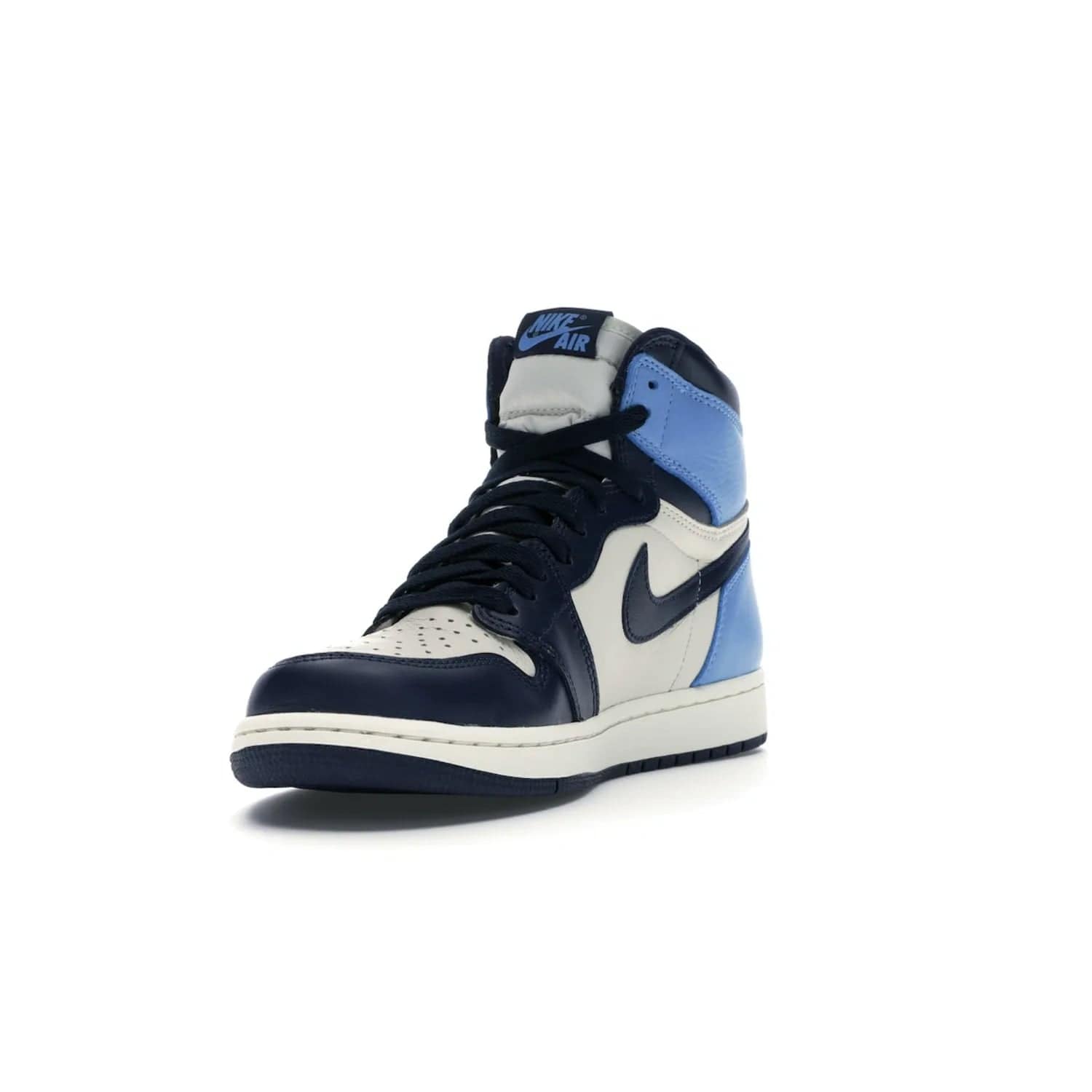 Jordan 1 Retro High Obsidian UNC - Image 13 - Only at www.BallersClubKickz.com - Bring a timeless classic to your wardrobe with the Air Jordan 1 Retro High "Obsidian/University Blue”. A full leather upper combines Obsidian and University Blue detailing for a retro Jordan style. Stitched Jumpman logo pays tribute to UNC. Experience classic style with a timeless sneaker.