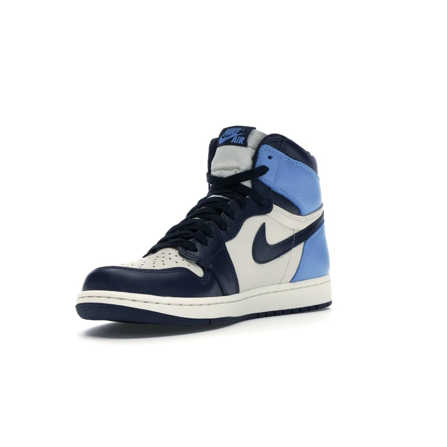 Jordan 1 Retro High Obsidian UNC - Image 14 - Only at www.BallersClubKickz.com - Bring a timeless classic to your wardrobe with the Air Jordan 1 Retro High "Obsidian/University Blue”. A full leather upper combines Obsidian and University Blue detailing for a retro Jordan style. Stitched Jumpman logo pays tribute to UNC. Experience classic style with a timeless sneaker.