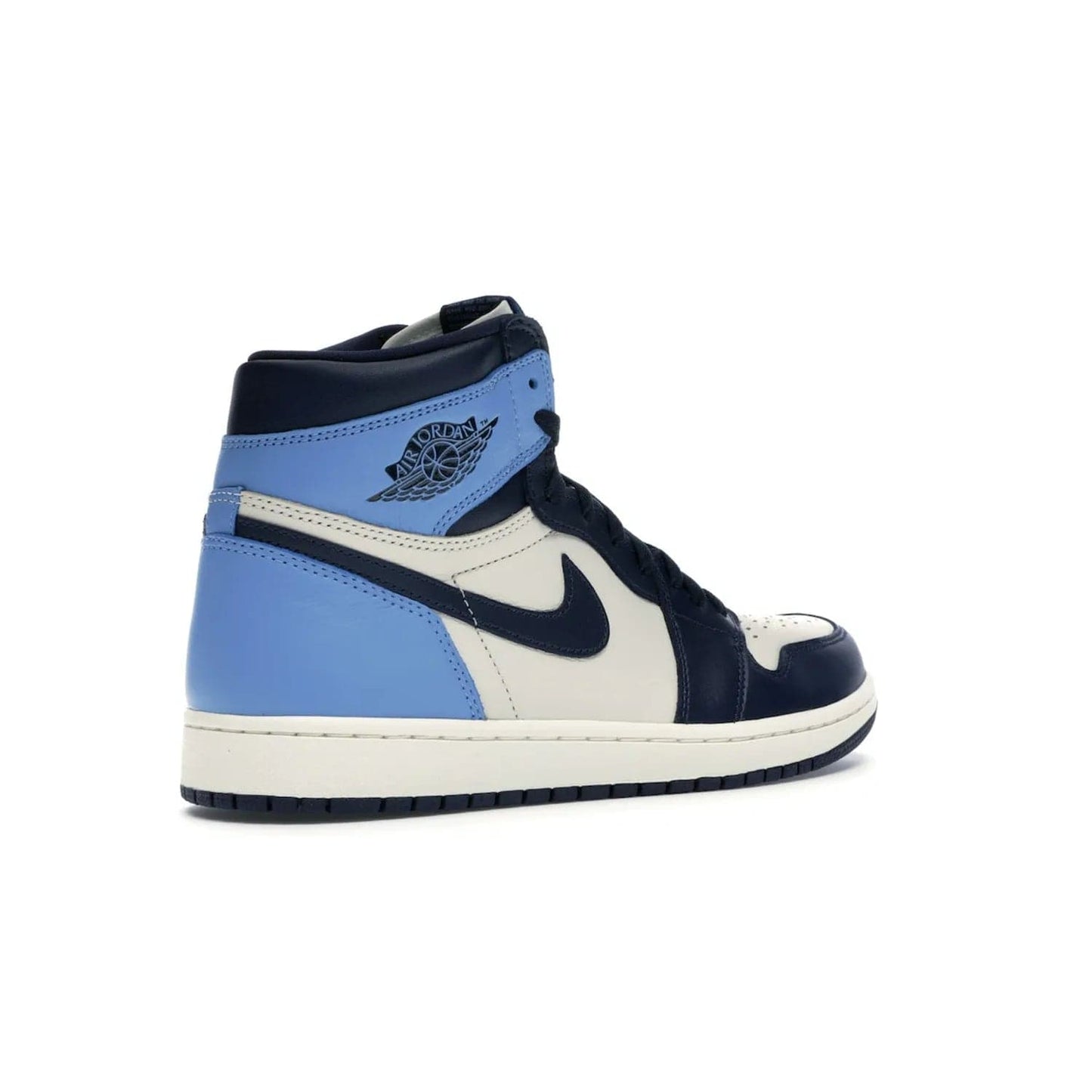 Jordan 1 Retro High Obsidian UNC - Image 33 - Only at www.BallersClubKickz.com - Bring a timeless classic to your wardrobe with the Air Jordan 1 Retro High "Obsidian/University Blue”. A full leather upper combines Obsidian and University Blue detailing for a retro Jordan style. Stitched Jumpman logo pays tribute to UNC. Experience classic style with a timeless sneaker.
