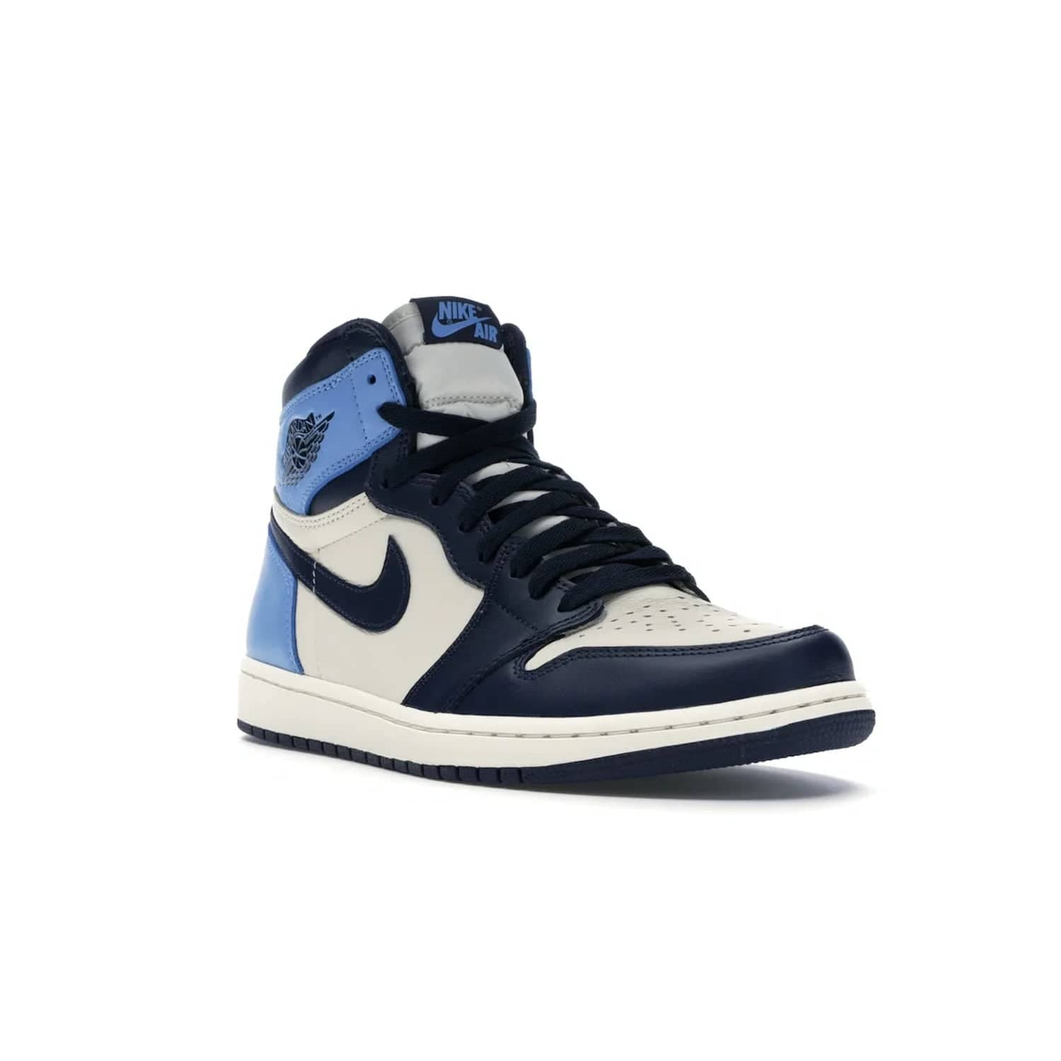 Jordan 1 Retro High Obsidian UNC - Image 6 - Only at www.BallersClubKickz.com - Bring a timeless classic to your wardrobe with the Air Jordan 1 Retro High "Obsidian/University Blue”. A full leather upper combines Obsidian and University Blue detailing for a retro Jordan style. Stitched Jumpman logo pays tribute to UNC. Experience classic style with a timeless sneaker.