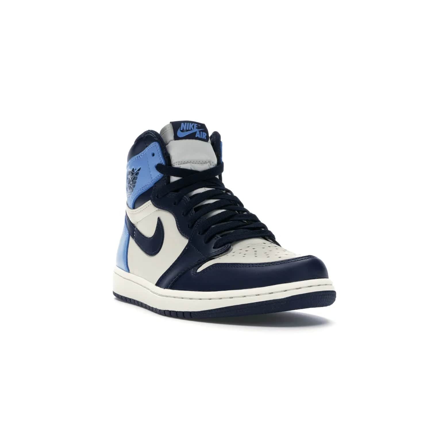 Jordan 1 Retro High Obsidian UNC - Image 7 - Only at www.BallersClubKickz.com - Bring a timeless classic to your wardrobe with the Air Jordan 1 Retro High "Obsidian/University Blue”. A full leather upper combines Obsidian and University Blue detailing for a retro Jordan style. Stitched Jumpman logo pays tribute to UNC. Experience classic style with a timeless sneaker.