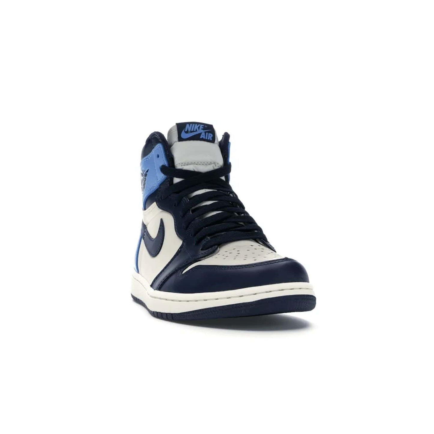 Jordan 1 Retro High Obsidian UNC - Image 8 - Only at www.BallersClubKickz.com - Bring a timeless classic to your wardrobe with the Air Jordan 1 Retro High "Obsidian/University Blue”. A full leather upper combines Obsidian and University Blue detailing for a retro Jordan style. Stitched Jumpman logo pays tribute to UNC. Experience classic style with a timeless sneaker.