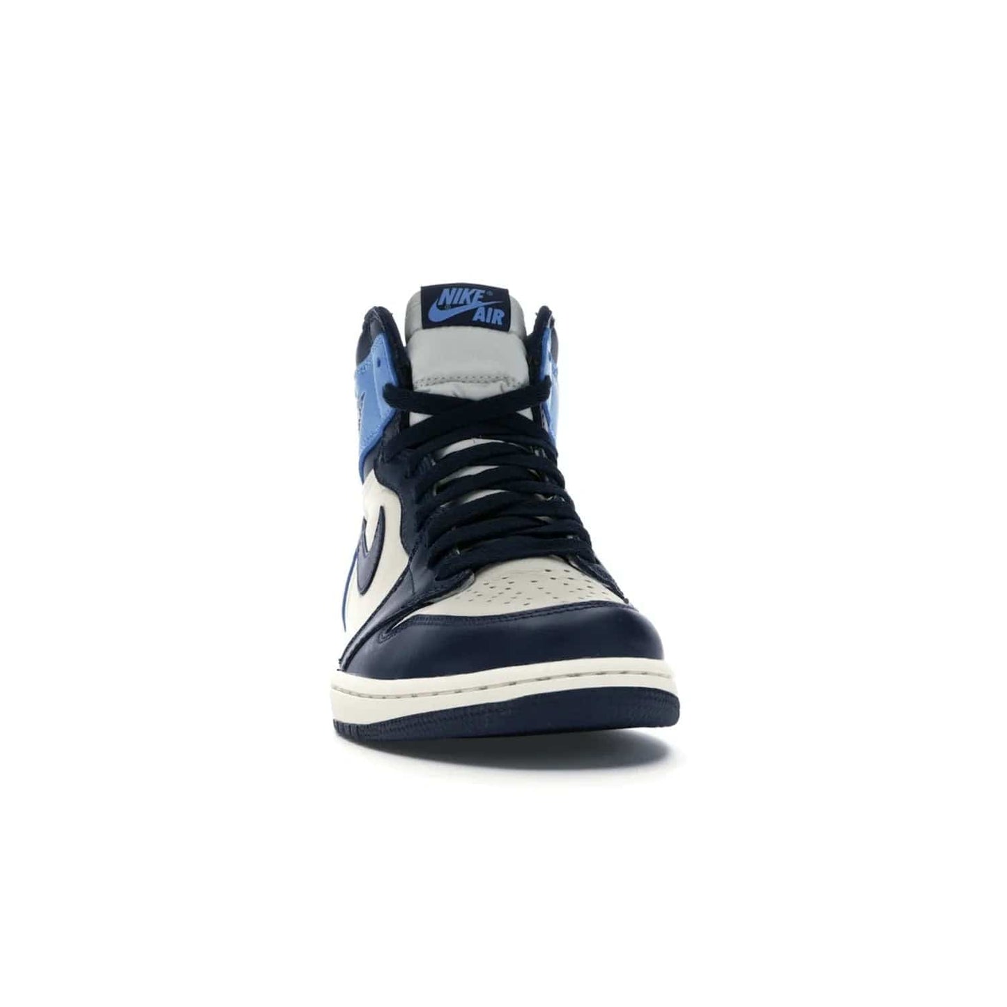 Jordan 1 Retro High Obsidian UNC - Image 9 - Only at www.BallersClubKickz.com - Bring a timeless classic to your wardrobe with the Air Jordan 1 Retro High "Obsidian/University Blue”. A full leather upper combines Obsidian and University Blue detailing for a retro Jordan style. Stitched Jumpman logo pays tribute to UNC. Experience classic style with a timeless sneaker.