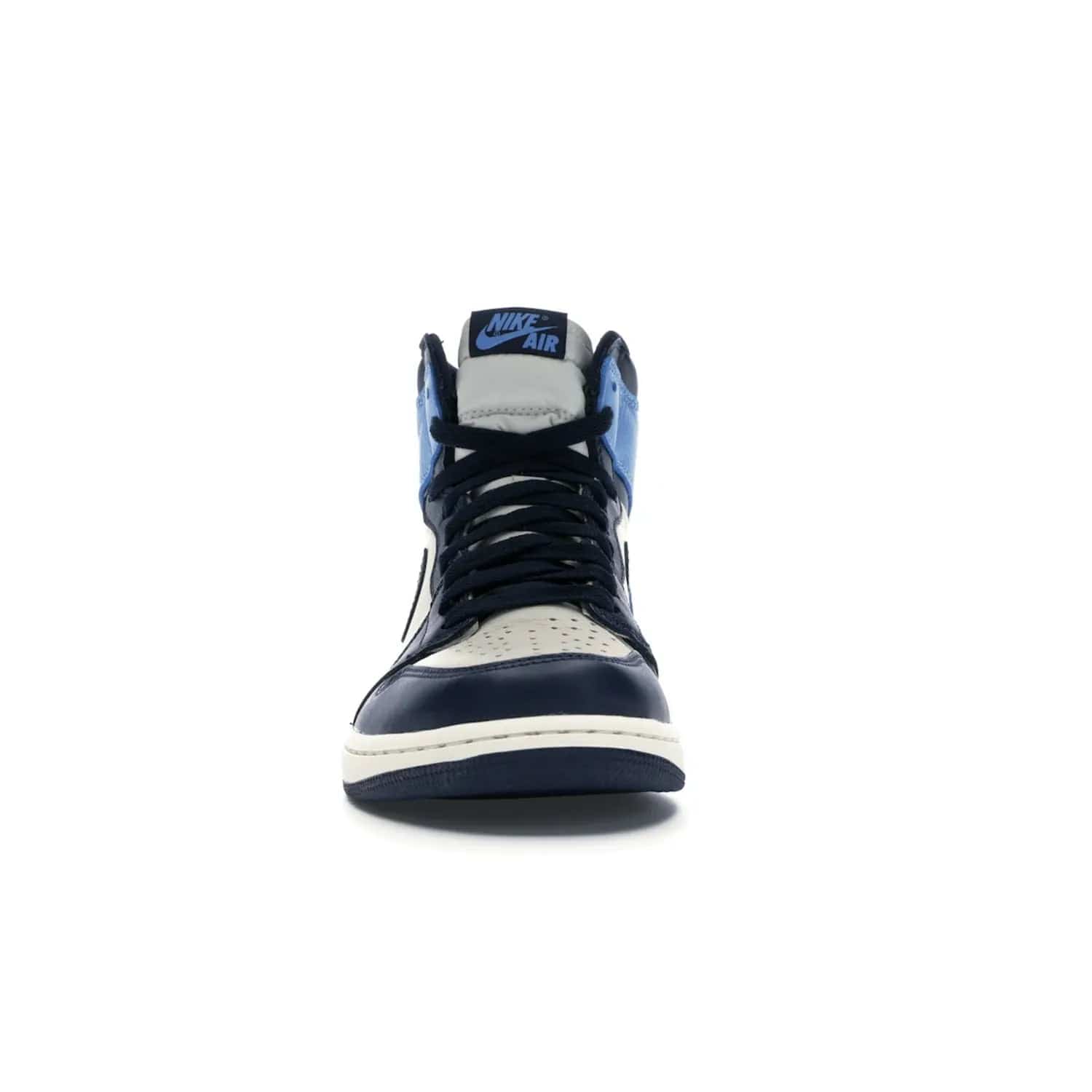 Jordan 1 Retro High Obsidian UNC - Image 10 - Only at www.BallersClubKickz.com - Bring a timeless classic to your wardrobe with the Air Jordan 1 Retro High "Obsidian/University Blue”. A full leather upper combines Obsidian and University Blue detailing for a retro Jordan style. Stitched Jumpman logo pays tribute to UNC. Experience classic style with a timeless sneaker.