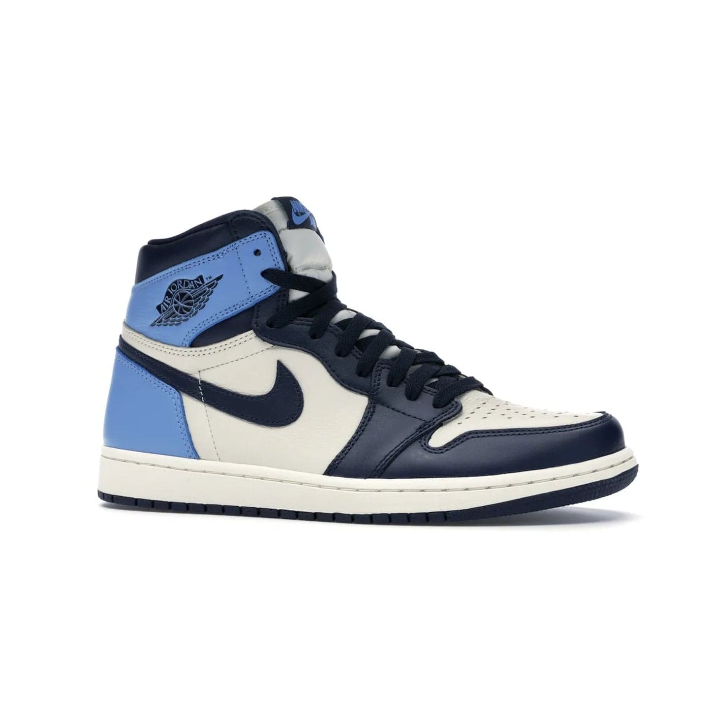 Jordan 1 Retro High Obsidian UNC - Image 3 - Only at www.BallersClubKickz.com - Bring a timeless classic to your wardrobe with the Air Jordan 1 Retro High "Obsidian/University Blue”. A full leather upper combines Obsidian and University Blue detailing for a retro Jordan style. Stitched Jumpman logo pays tribute to UNC. Experience classic style with a timeless sneaker.
