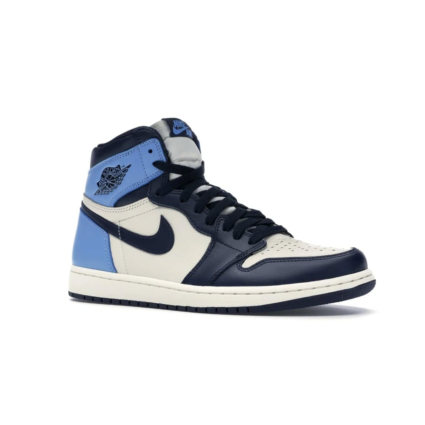 Jordan 1 Retro High Obsidian UNC - Image 4 - Only at www.BallersClubKickz.com - Bring a timeless classic to your wardrobe with the Air Jordan 1 Retro High "Obsidian/University Blue”. A full leather upper combines Obsidian and University Blue detailing for a retro Jordan style. Stitched Jumpman logo pays tribute to UNC. Experience classic style with a timeless sneaker.