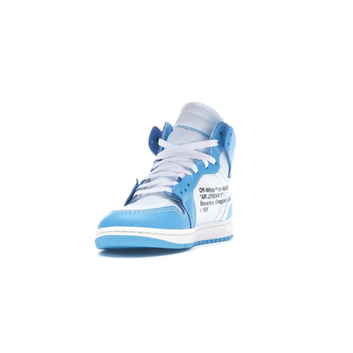 Jordan 1 Retro High Off-White University Blue - Image 13 - Only at www.BallersClubKickz.com - Classic Jordan 1 Retro High "Off-White UNC" sneakers meld style and comfort. Boasting deconstructed white and blue leather, Off-White detailing, and a white, dark powder blue and cone colorway, these sneakers are perfect for dressing up or down. Get the iconic Off-White Jordan 1's and upgrade your look.