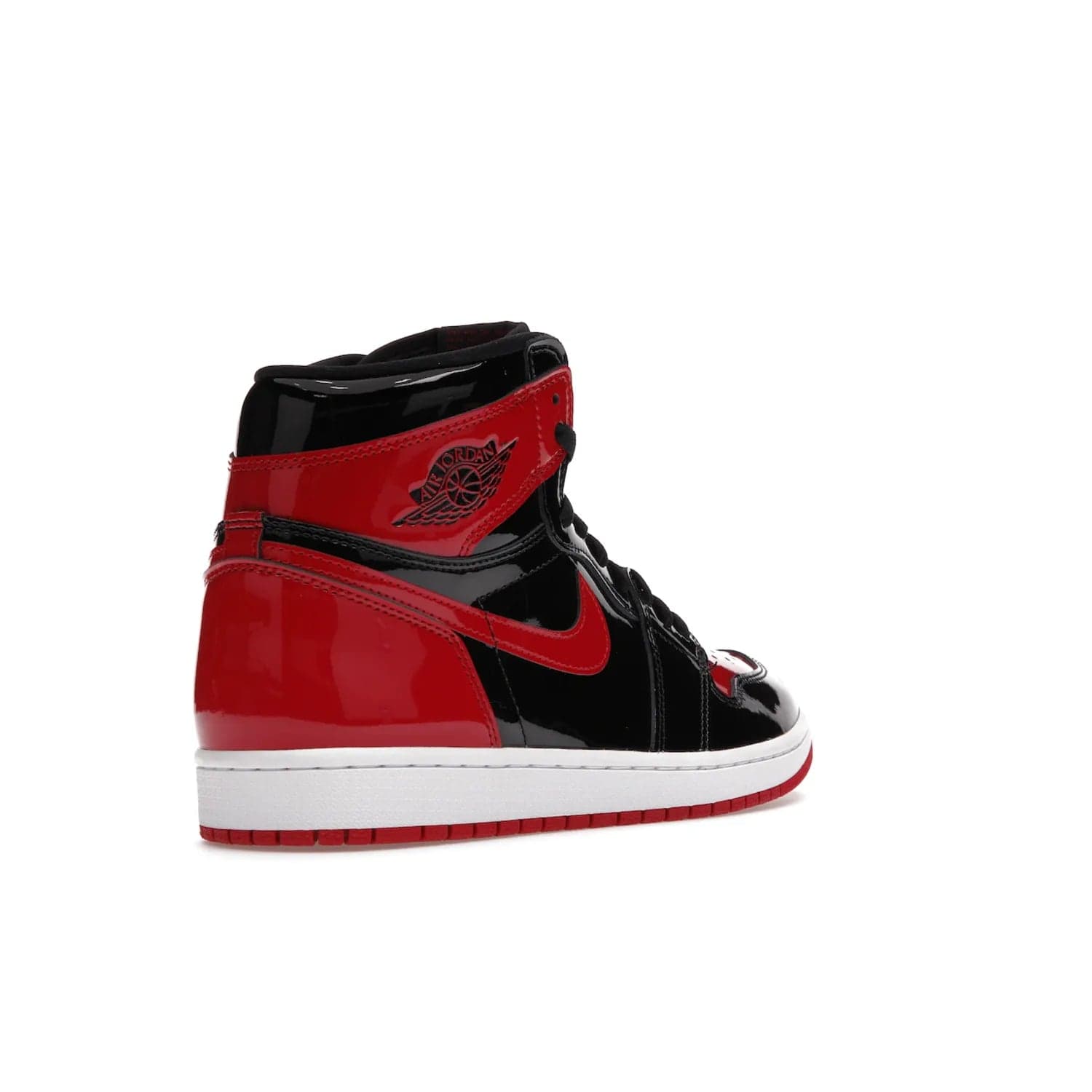Jordan 1 Retro High OG Patent Bred - Image 32 - Only at www.BallersClubKickz.com - Introducing Air Jordan 1 Retro High OG Patent Bred - sleek patent leather upper, signature weaved Nike Air tongue and classic Wings logo on collar. Red and white sole complete signature look. Releasing December 2021 - perfect retro edition for holidays.