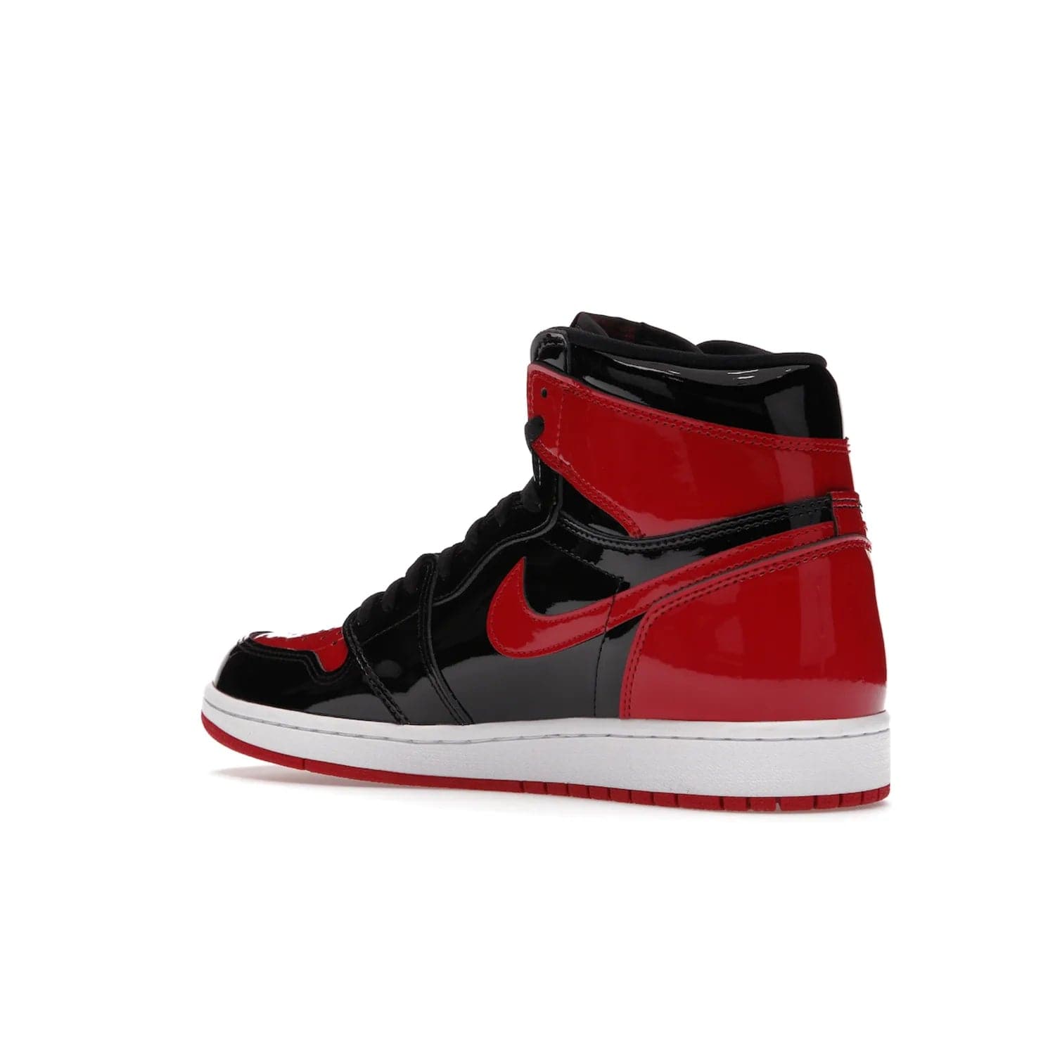 Jordan 1 Retro High OG Patent Bred - Image 23 - Only at www.BallersClubKickz.com - Introducing Air Jordan 1 Retro High OG Patent Bred - sleek patent leather upper, signature weaved Nike Air tongue and classic Wings logo on collar. Red and white sole complete signature look. Releasing December 2021 - perfect retro edition for holidays.
