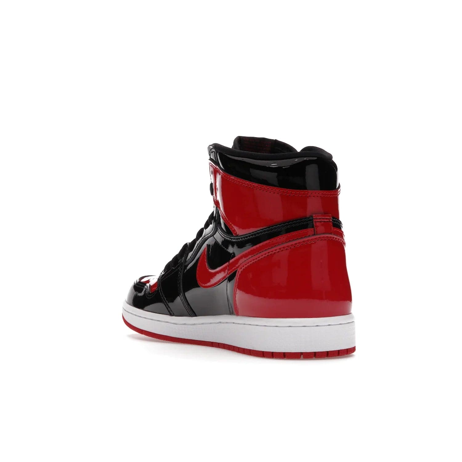 Jordan 1 Retro High OG Patent Bred - Image 25 - Only at www.BallersClubKickz.com - Introducing Air Jordan 1 Retro High OG Patent Bred - sleek patent leather upper, signature weaved Nike Air tongue and classic Wings logo on collar. Red and white sole complete signature look. Releasing December 2021 - perfect retro edition for holidays.