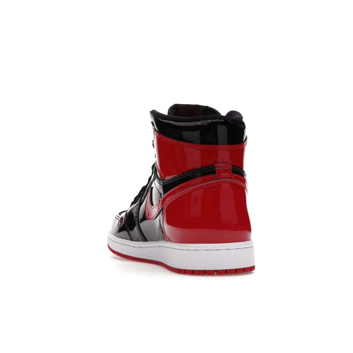 Jordan 1 Retro High OG Patent Bred - Image 26 - Only at www.BallersClubKickz.com - Introducing Air Jordan 1 Retro High OG Patent Bred - sleek patent leather upper, signature weaved Nike Air tongue and classic Wings logo on collar. Red and white sole complete signature look. Releasing December 2021 - perfect retro edition for holidays.