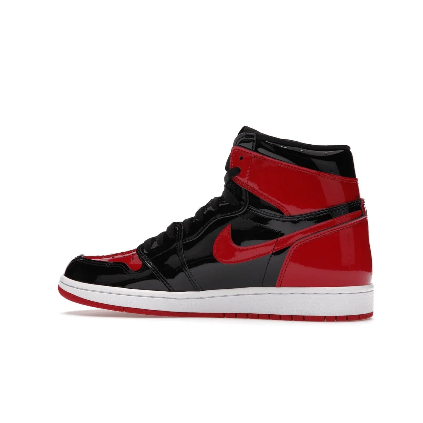Jordan 1 Retro High OG Patent Bred - Image 21 - Only at www.BallersClubKickz.com - Introducing Air Jordan 1 Retro High OG Patent Bred - sleek patent leather upper, signature weaved Nike Air tongue and classic Wings logo on collar. Red and white sole complete signature look. Releasing December 2021 - perfect retro edition for holidays.