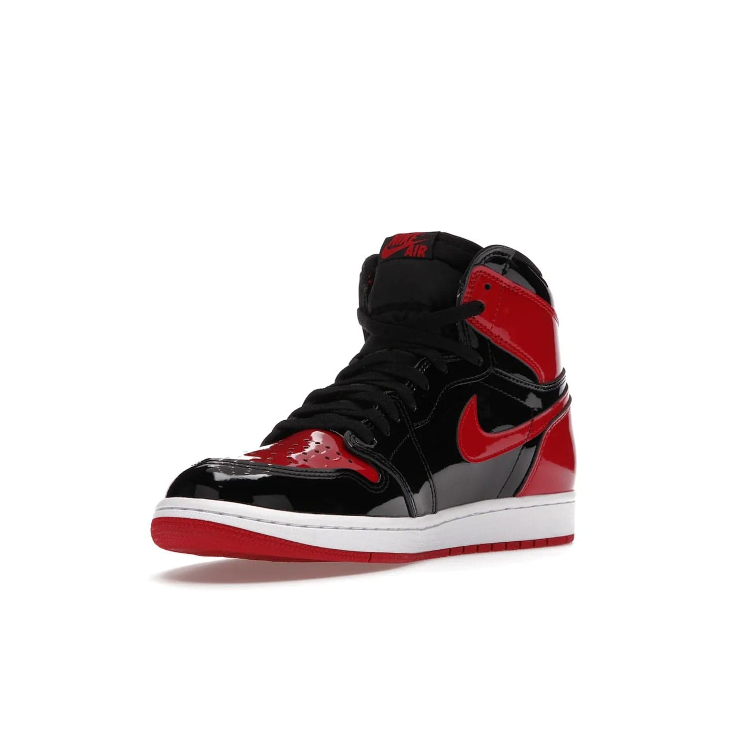 Jordan 1 Retro High OG Patent Bred - Image 14 - Only at www.BallersClubKickz.com - Introducing Air Jordan 1 Retro High OG Patent Bred - sleek patent leather upper, signature weaved Nike Air tongue and classic Wings logo on collar. Red and white sole complete signature look. Releasing December 2021 - perfect retro edition for holidays.
