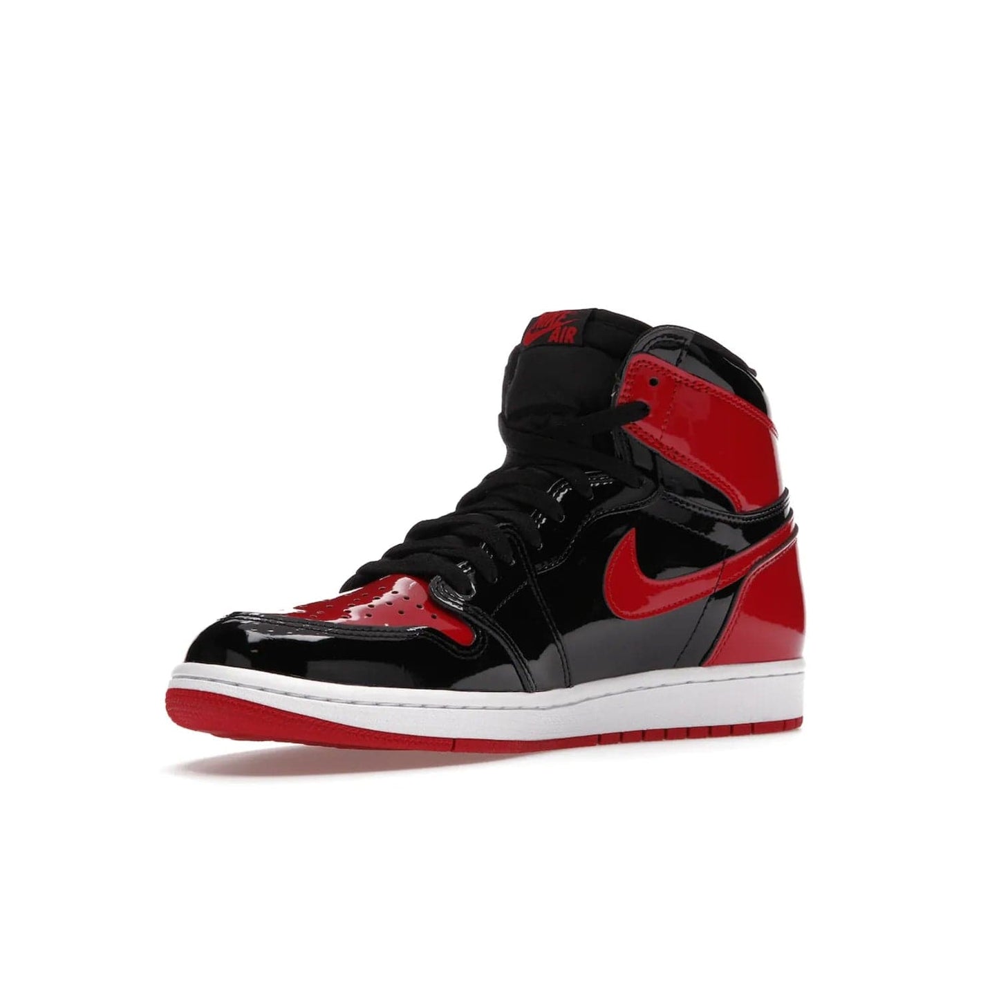 Jordan 1 Retro High OG Patent Bred - Image 15 - Only at www.BallersClubKickz.com - Introducing Air Jordan 1 Retro High OG Patent Bred - sleek patent leather upper, signature weaved Nike Air tongue and classic Wings logo on collar. Red and white sole complete signature look. Releasing December 2021 - perfect retro edition for holidays.