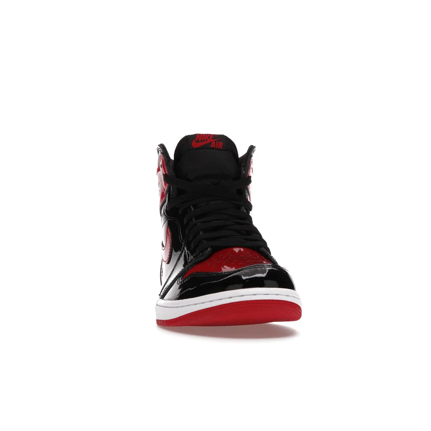 Jordan 1 Retro High OG Patent Bred - Image 9 - Only at www.BallersClubKickz.com - Introducing Air Jordan 1 Retro High OG Patent Bred - sleek patent leather upper, signature weaved Nike Air tongue and classic Wings logo on collar. Red and white sole complete signature look. Releasing December 2021 - perfect retro edition for holidays.