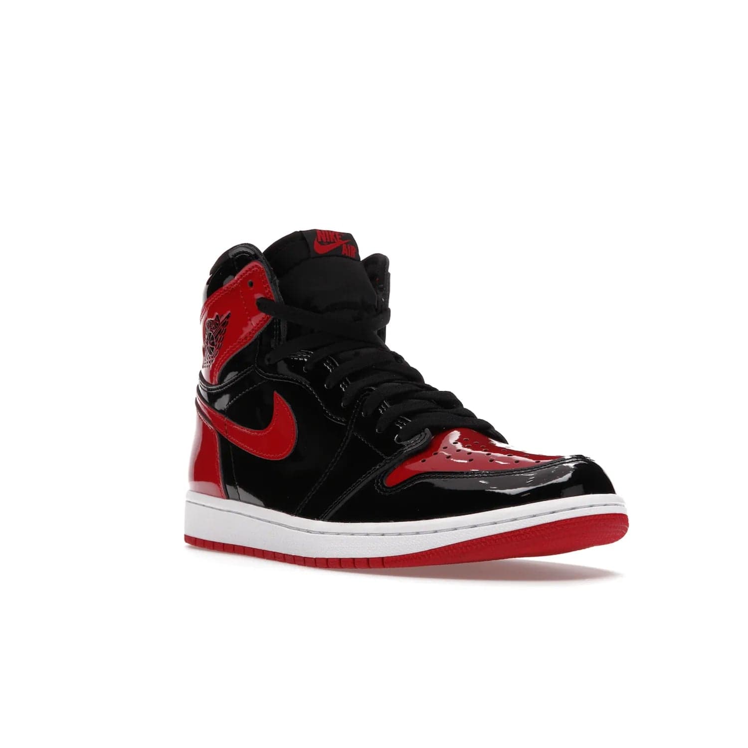 Jordan 1 Retro High OG Patent Bred - Image 6 - Only at www.BallersClubKickz.com - Introducing Air Jordan 1 Retro High OG Patent Bred - sleek patent leather upper, signature weaved Nike Air tongue and classic Wings logo on collar. Red and white sole complete signature look. Releasing December 2021 - perfect retro edition for holidays.