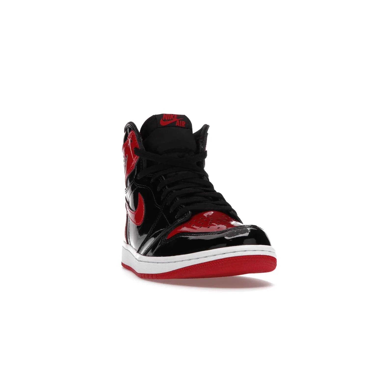 Jordan 1 Retro High OG Patent Bred - Image 8 - Only at www.BallersClubKickz.com - Introducing Air Jordan 1 Retro High OG Patent Bred - sleek patent leather upper, signature weaved Nike Air tongue and classic Wings logo on collar. Red and white sole complete signature look. Releasing December 2021 - perfect retro edition for holidays.