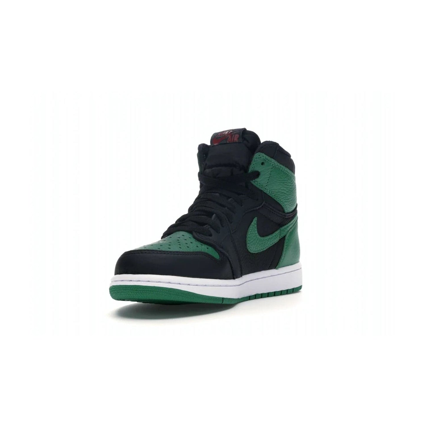 Jordan 1 Retro High Pine Green Black - Image 13 - Only at www.BallersClubKickz.com - Step into fresh style with the Jordan 1 Retro High Pine Green Black. Combining a black tumbled leather upper with green leather overlays, this sneaker features a Gym Red embroidered tongue tag, sail midsole, and pine green outsole for iconic style with a unique twist.