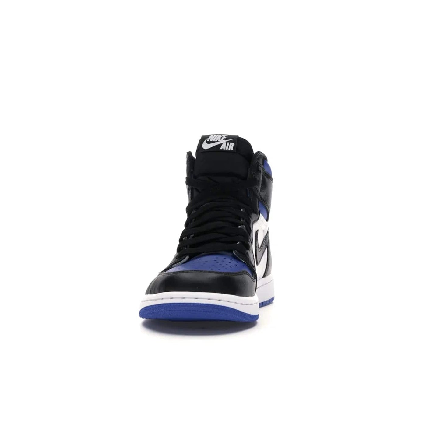 Jordan 1 Retro High Royal Toe - Image 11 - Only at www.BallersClubKickz.com - Refresh your look with the Jordan 1 Retro High Royal Toe. This classic AJ 1 sports a white and royal leather upper, black leather overlays, and branded leather tongue tag. Pick up today and set the streets ablaze.