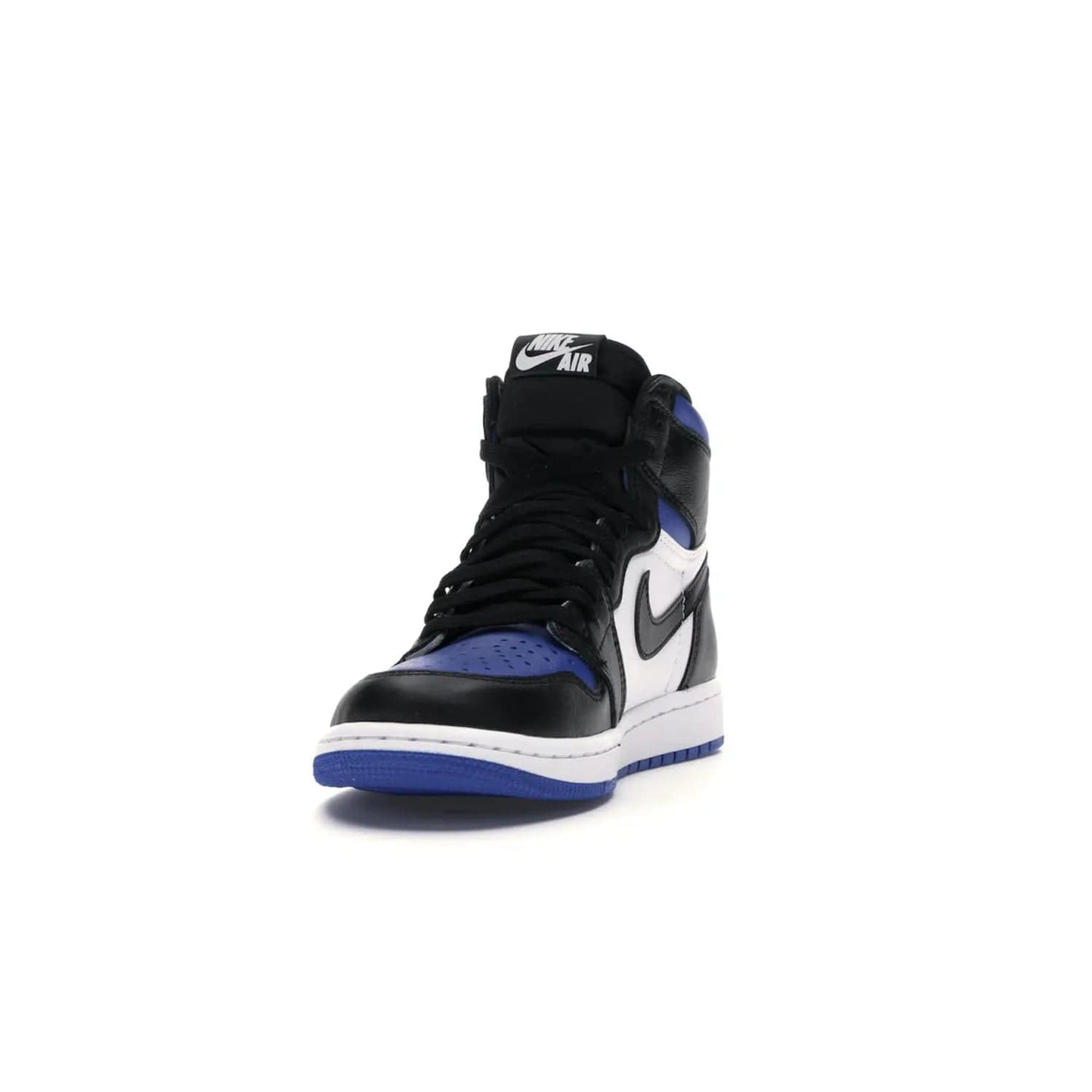 Jordan 1 Retro High Royal Toe - Image 12 - Only at www.BallersClubKickz.com - Refresh your look with the Jordan 1 Retro High Royal Toe. This classic AJ 1 sports a white and royal leather upper, black leather overlays, and branded leather tongue tag. Pick up today and set the streets ablaze.