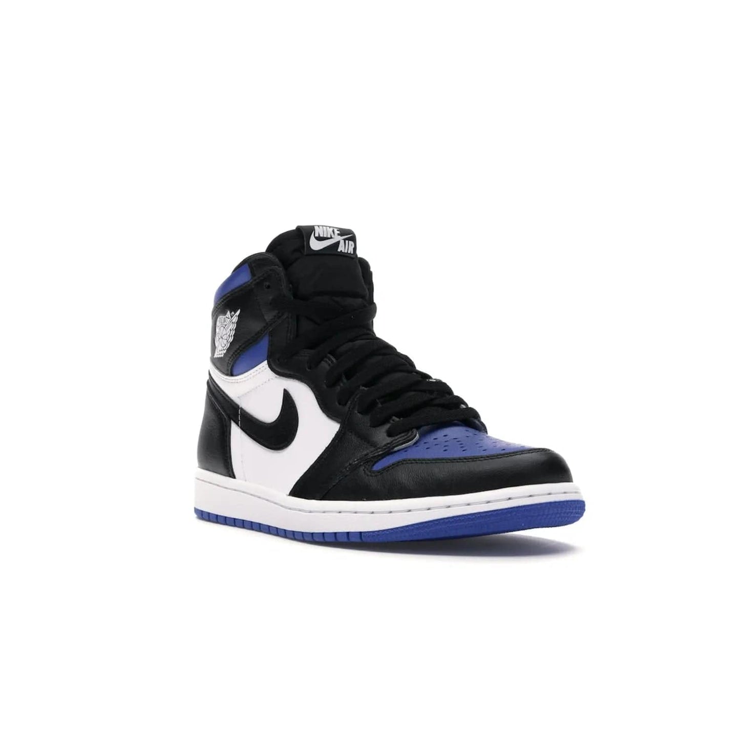 Jordan 1 Retro High Royal Toe - Image 6 - Only at www.BallersClubKickz.com - Refresh your look with the Jordan 1 Retro High Royal Toe. This classic AJ 1 sports a white and royal leather upper, black leather overlays, and branded leather tongue tag. Pick up today and set the streets ablaze.