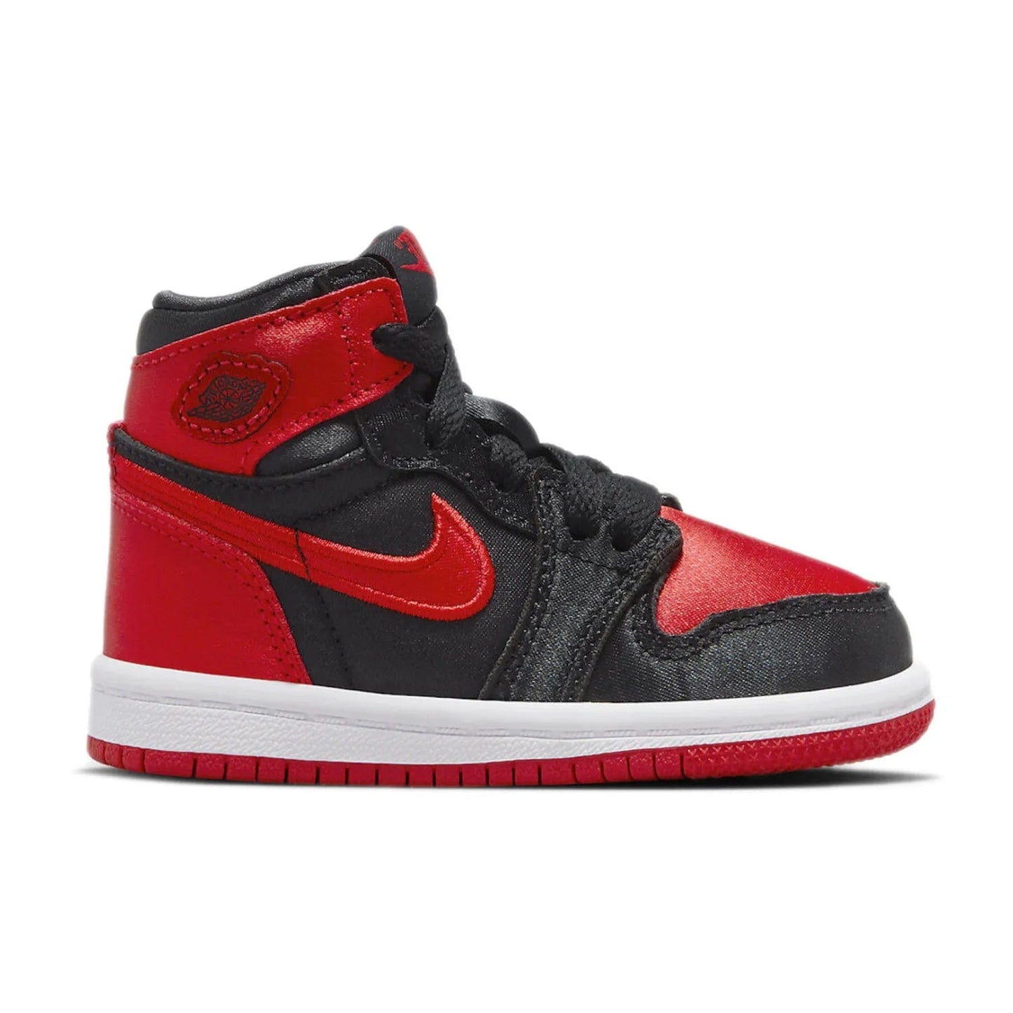 Jordan 1 Retro High OG Satin Bred (TD) - Image 1 - Only at www.BallersClubKickz.com - The Jordan 1 Retro High OG Satin Bred (TD) features a sleek black upper and bold University Red and White accents. The Satin material construction gives an elevated look. Get this must-have Jordan 1 when it releases in 2023.