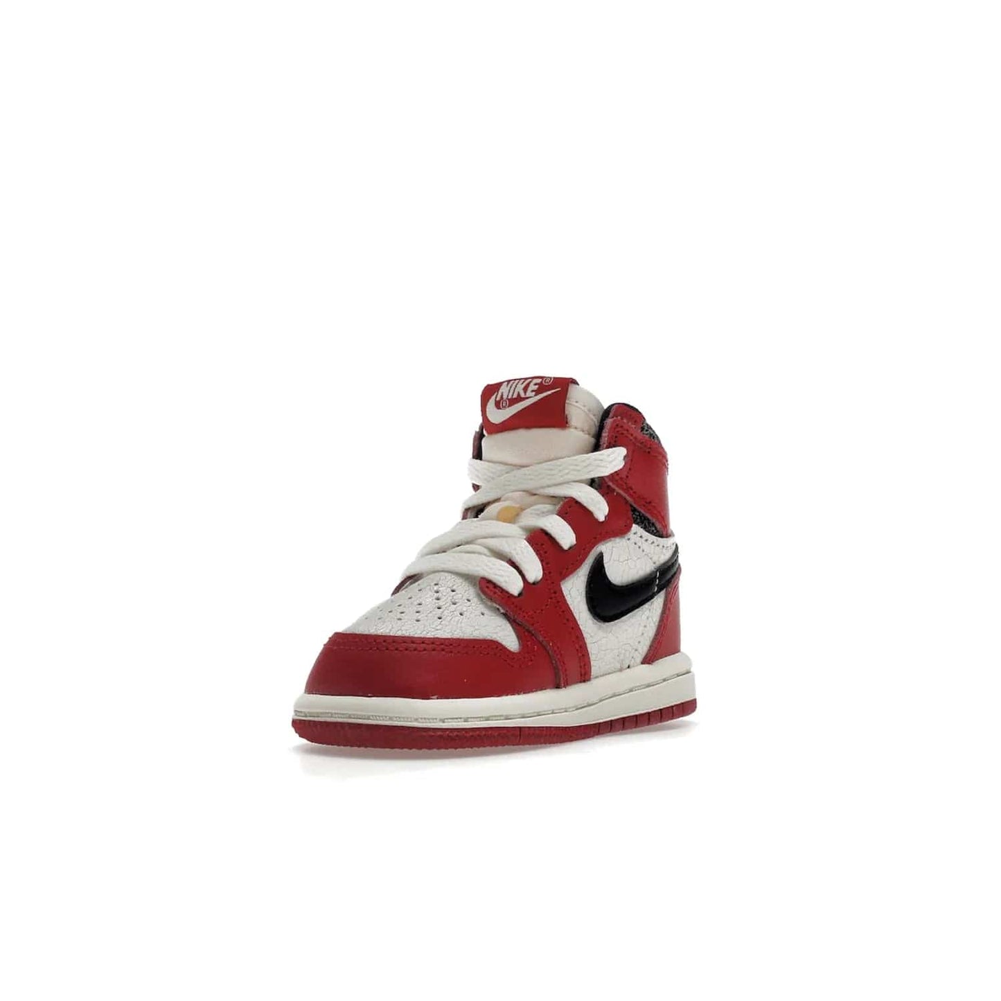 Jordan 1 Retro High OG Chicago Lost and Found (TD) - Image 14 - Only at www.BallersClubKickz.com - Introducing the Air Jordan 1 Retro High OG Lost and Found TD – a vibrant combination of 4 colors: muslin, varsity, sail and black. Featuring a crackled leather upper and AIR units for comfort and a signature Wings logo, these retro shoes add comfort and style for your little ones at $70. Get your pair before 19th December 2022!