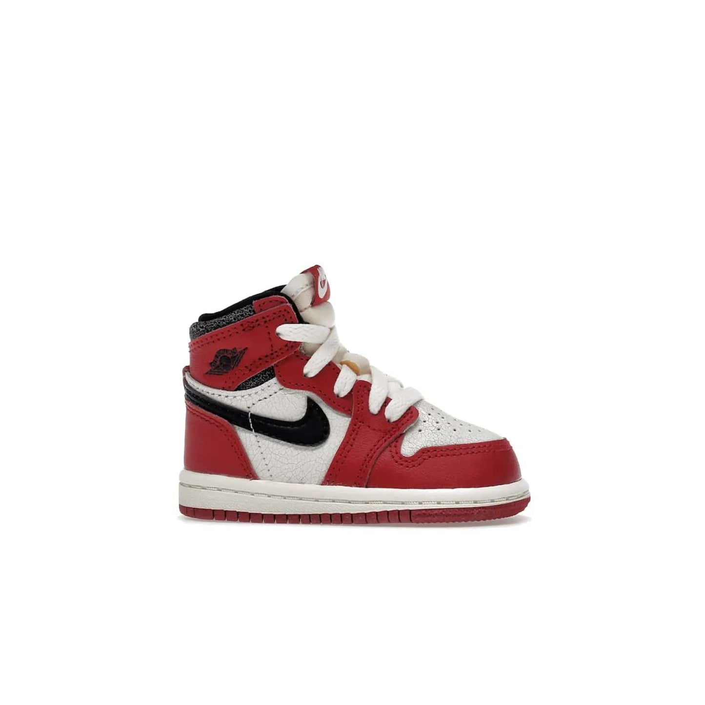 Jordan 1 Retro High OG Chicago Lost and Found (TD) - Image 2 - Only at www.BallersClubKickz.com - Introducing the Air Jordan 1 Retro High OG Lost and Found TD – a vibrant combination of 4 colors: muslin, varsity, sail and black. Featuring a crackled leather upper and AIR units for comfort and a signature Wings logo, these retro shoes add comfort and style for your little ones at $70. Get your pair before 19th December 2022!