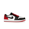 Jordan 1 Retro Low OG Black Toe (2023) - Image 2 - Only at www.BallersClubKickz.com - Upgrade your wardrobe with the Jordan 1 Retro Low OG Black Toe featuring a classic black and white upper and dynamic red heel counter. Eye-catching white midsole and iconic black Swoosh and Wings complete the timeless yet modern look. Shop now to own this iconic shoe!
