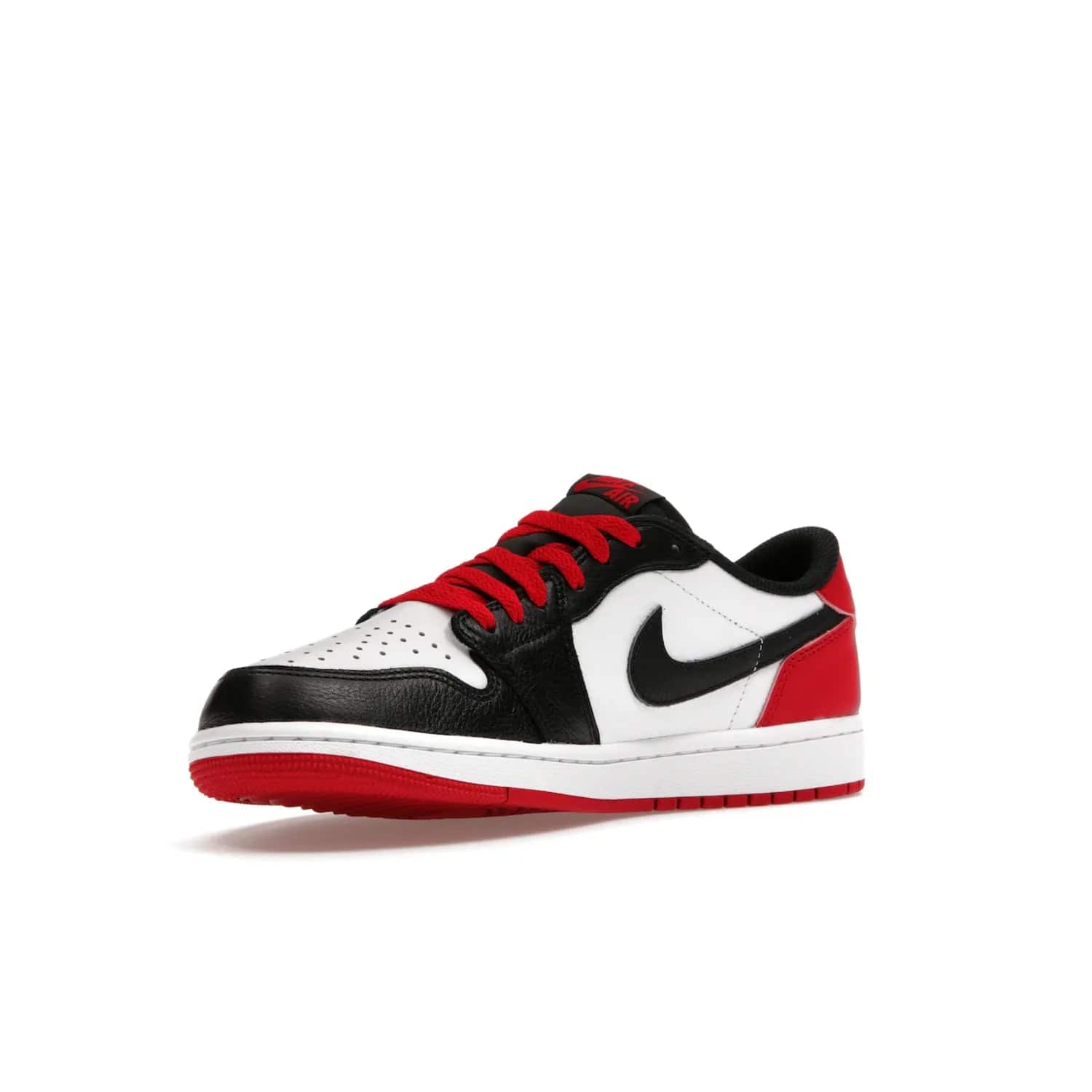 Jordan 1 Retro Low OG Black Toe (2023) - Image 15 - Only at www.BallersClubKickz.com - Upgrade your wardrobe with the Jordan 1 Retro Low OG Black Toe featuring a classic black and white upper and dynamic red heel counter. Eye-catching white midsole and iconic black Swoosh and Wings complete the timeless yet modern look. Shop now to own this iconic shoe!