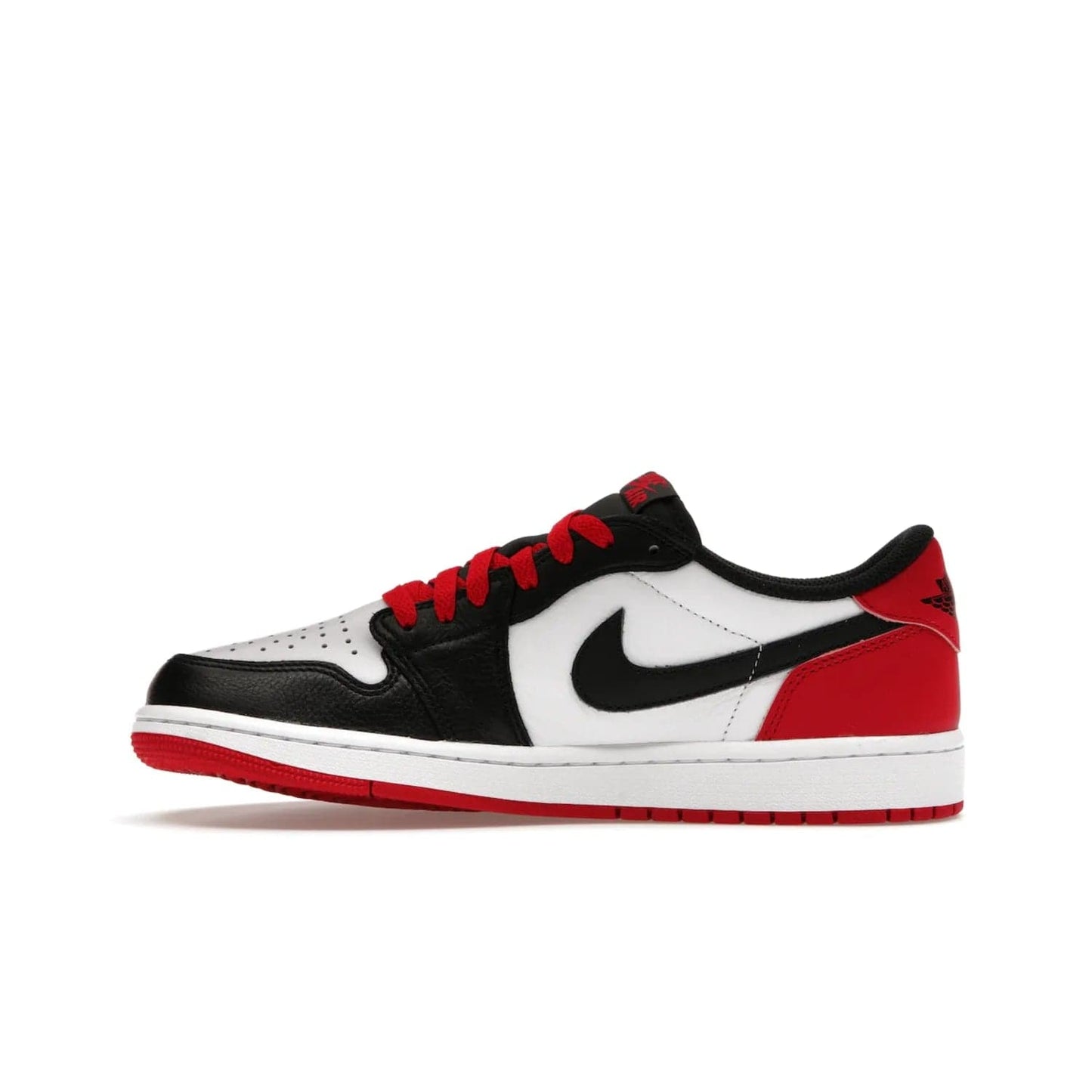 Jordan 1 Retro Low OG Black Toe (2023) - Image 19 - Only at www.BallersClubKickz.com - Upgrade your wardrobe with the Jordan 1 Retro Low OG Black Toe featuring a classic black and white upper and dynamic red heel counter. Eye-catching white midsole and iconic black Swoosh and Wings complete the timeless yet modern look. Shop now to own this iconic shoe!
