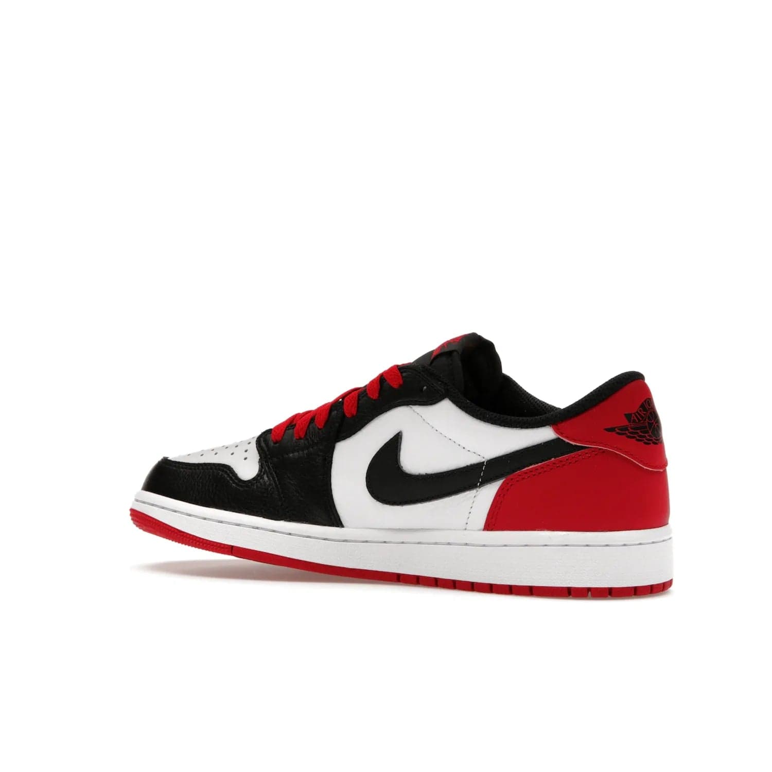 Jordan 1 Retro Low OG Black Toe (2023) - Image 22 - Only at www.BallersClubKickz.com - Upgrade your wardrobe with the Jordan 1 Retro Low OG Black Toe featuring a classic black and white upper and dynamic red heel counter. Eye-catching white midsole and iconic black Swoosh and Wings complete the timeless yet modern look. Shop now to own this iconic shoe!