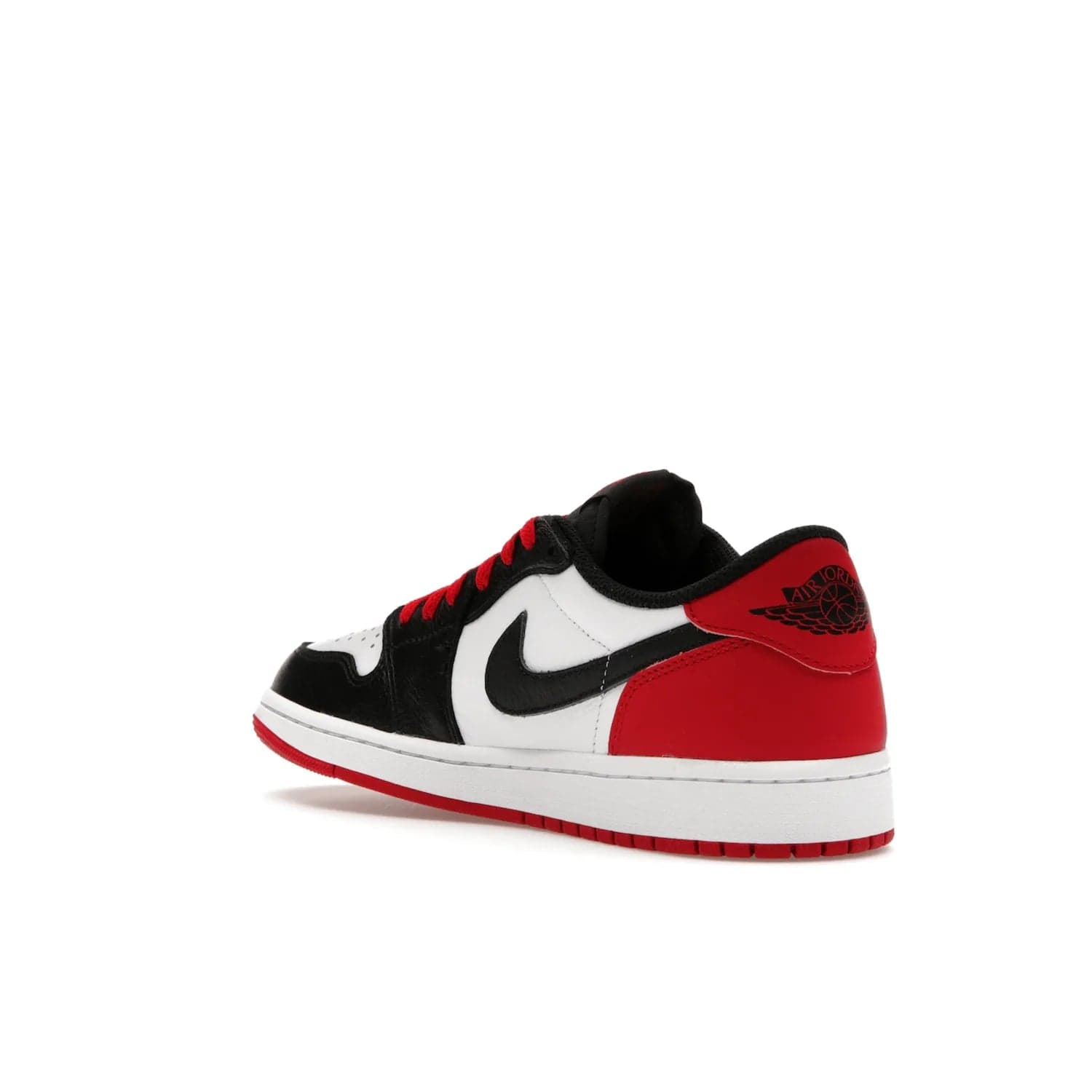 Jordan 1 Retro Low OG Black Toe (2023) - Image 24 - Only at www.BallersClubKickz.com - Upgrade your wardrobe with the Jordan 1 Retro Low OG Black Toe featuring a classic black and white upper and dynamic red heel counter. Eye-catching white midsole and iconic black Swoosh and Wings complete the timeless yet modern look. Shop now to own this iconic shoe!