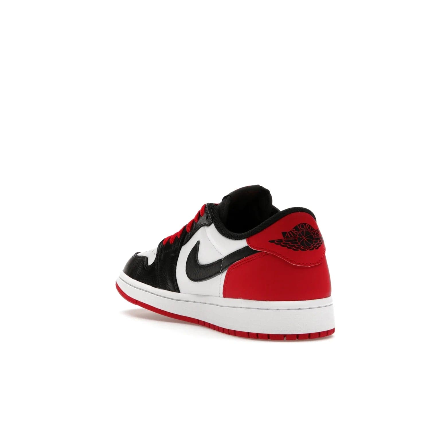 Jordan 1 Retro Low OG Black Toe (2023) - Image 25 - Only at www.BallersClubKickz.com - Upgrade your wardrobe with the Jordan 1 Retro Low OG Black Toe featuring a classic black and white upper and dynamic red heel counter. Eye-catching white midsole and iconic black Swoosh and Wings complete the timeless yet modern look. Shop now to own this iconic shoe!