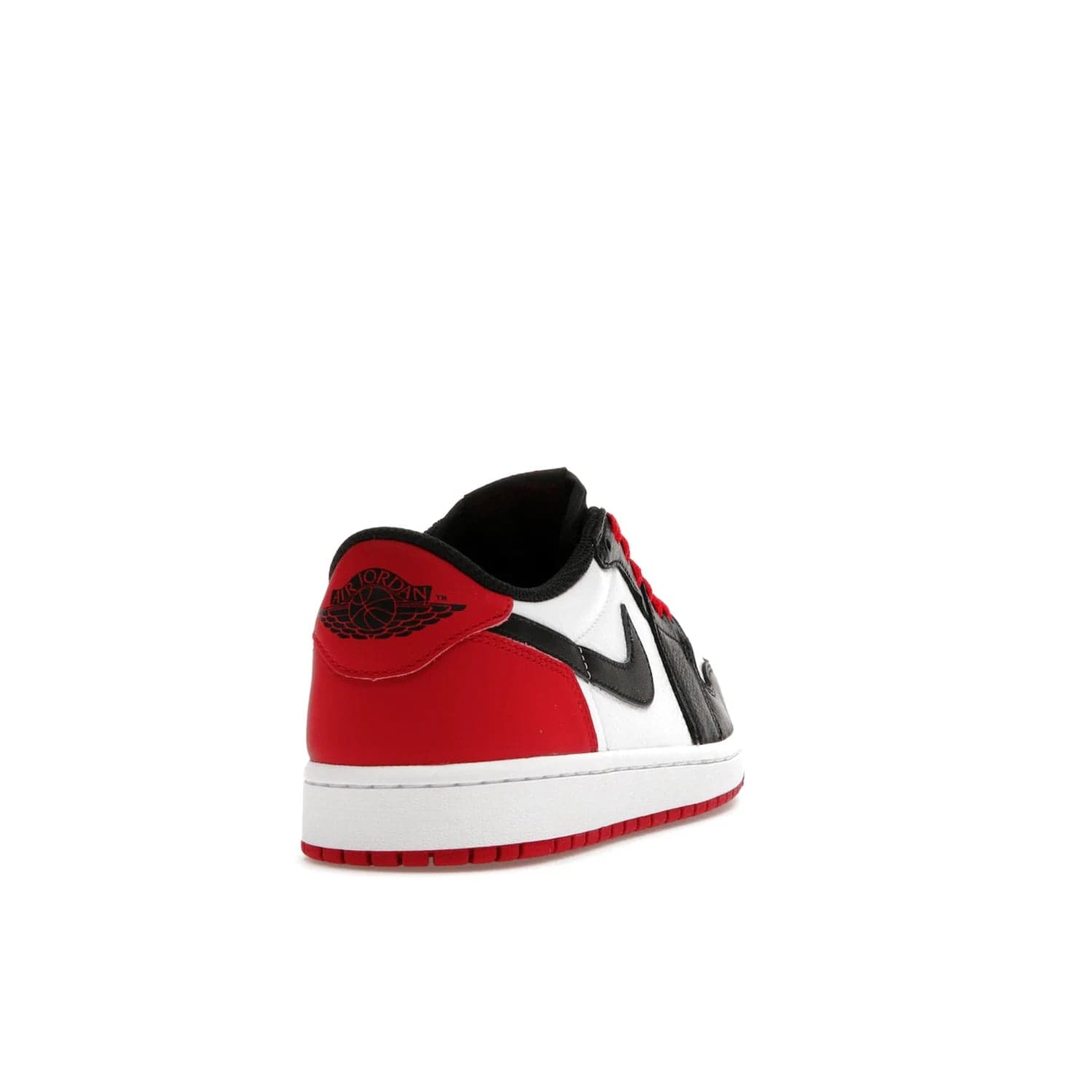 Jordan 1 Retro Low OG Black Toe (2023) - Image 30 - Only at www.BallersClubKickz.com - Upgrade your wardrobe with the Jordan 1 Retro Low OG Black Toe featuring a classic black and white upper and dynamic red heel counter. Eye-catching white midsole and iconic black Swoosh and Wings complete the timeless yet modern look. Shop now to own this iconic shoe!