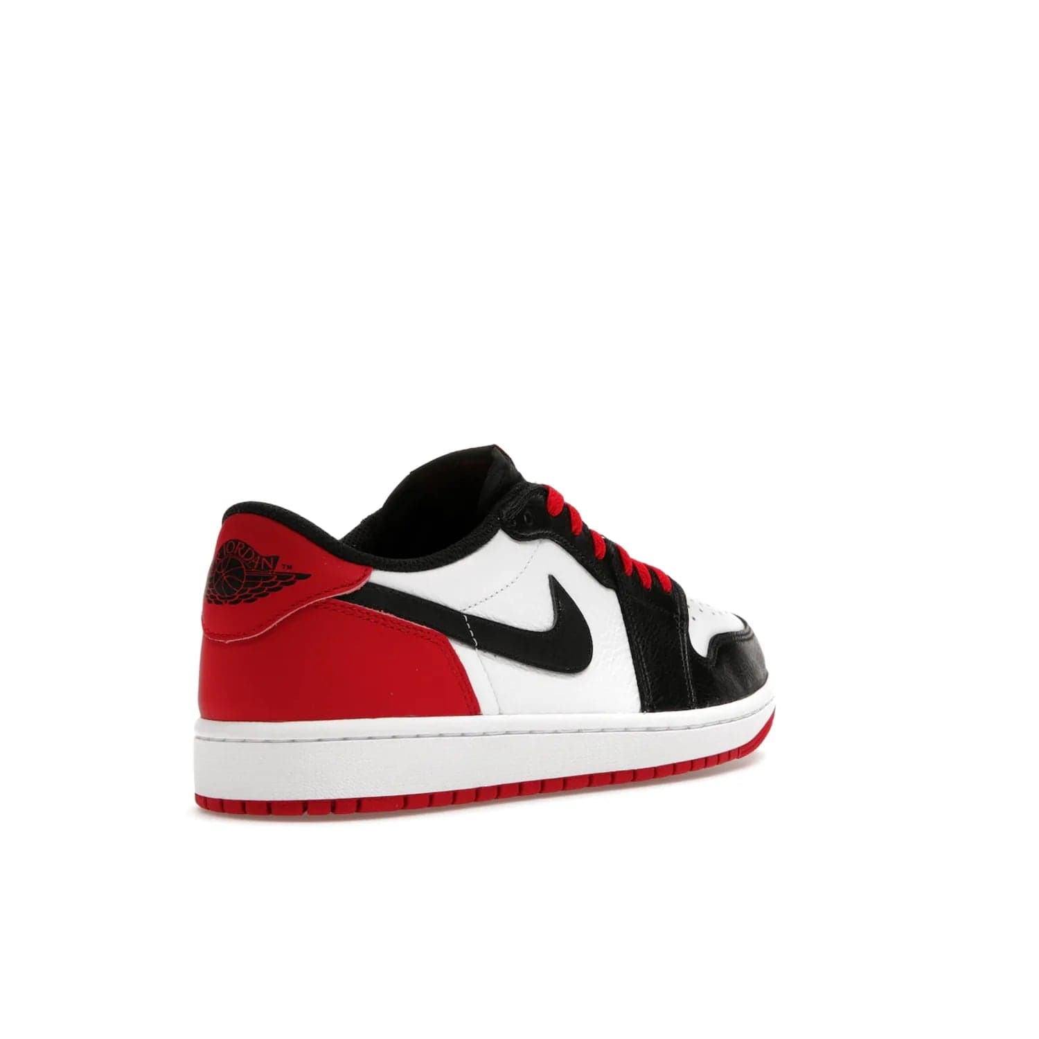 Jordan 1 Retro Low OG Black Toe (2023) - Image 32 - Only at www.BallersClubKickz.com - Upgrade your wardrobe with the Jordan 1 Retro Low OG Black Toe featuring a classic black and white upper and dynamic red heel counter. Eye-catching white midsole and iconic black Swoosh and Wings complete the timeless yet modern look. Shop now to own this iconic shoe!