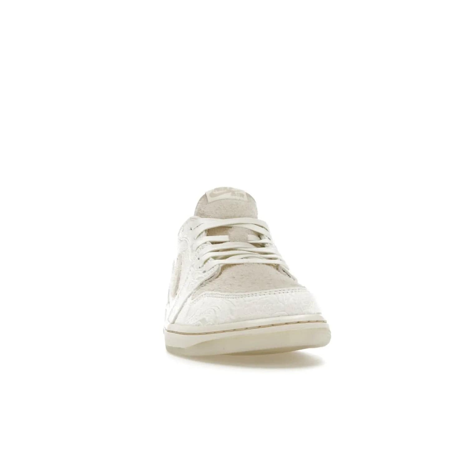 Jordan 1 Retro Low OG Chris Paul - Image 9 - Only at www.BallersClubKickz.com - Jordan 1 Retro Low OG Chris Paul has arrived in a timeless colorway. Light cream upper with matching sail trim and the iconic Jumpman logo. Add classic style to your wardrobe with this sleek sneaker. Grab your pair today!