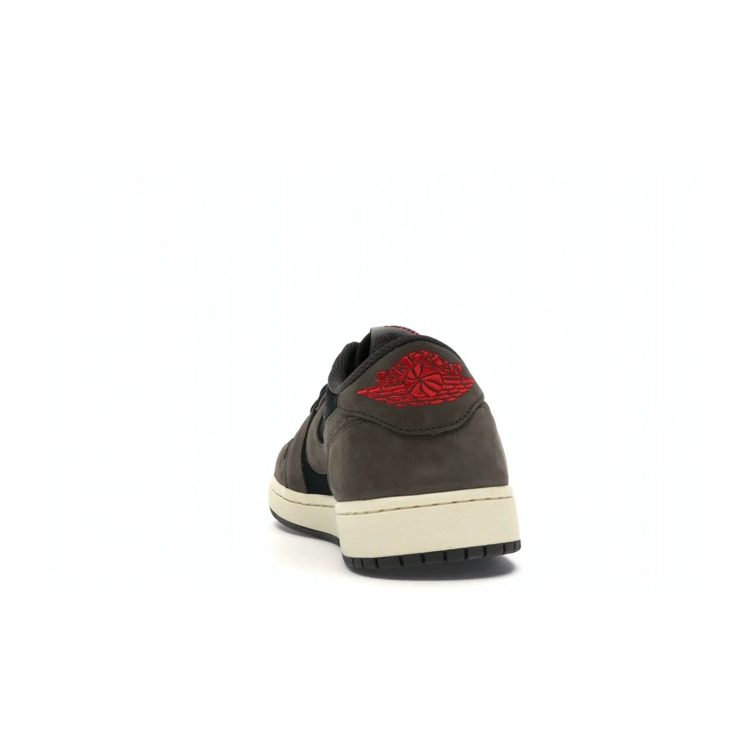 Jordan 1 Retro Low OG SP Travis Scott - Image 27 - Only at www.BallersClubKickz.com - The Air Jordan 1 Low Travis Scott combines modern and classic design elements for a stylish look. It features a black upper with dark brown overlays, red accents, sail midsole, and dark brown outsole. Signature touches include a backwards Swoosh logo and “Cactus Jack” inscriptions. Released in July 2019.