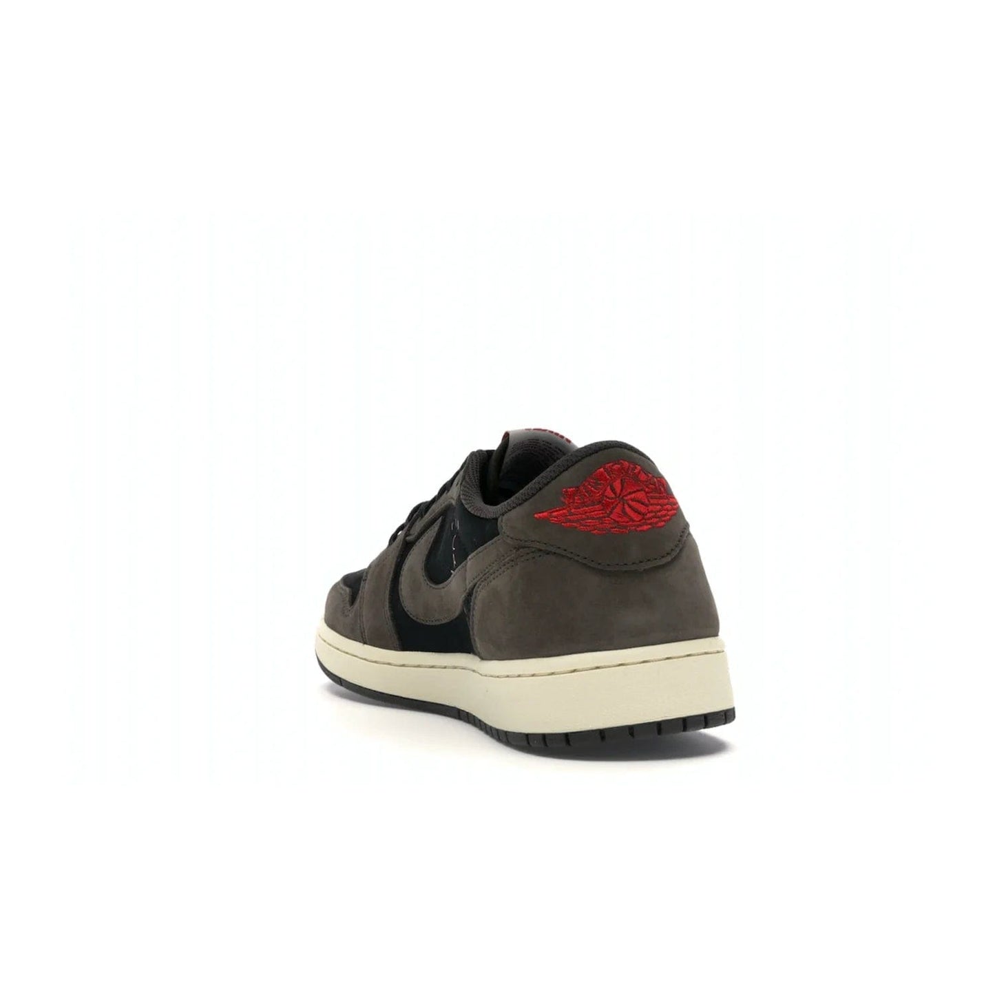 Jordan 1 Retro Low OG SP Travis Scott - Image 26 - Only at www.BallersClubKickz.com - The Air Jordan 1 Low Travis Scott combines modern and classic design elements for a stylish look. It features a black upper with dark brown overlays, red accents, sail midsole, and dark brown outsole. Signature touches include a backwards Swoosh logo and “Cactus Jack” inscriptions. Released in July 2019.