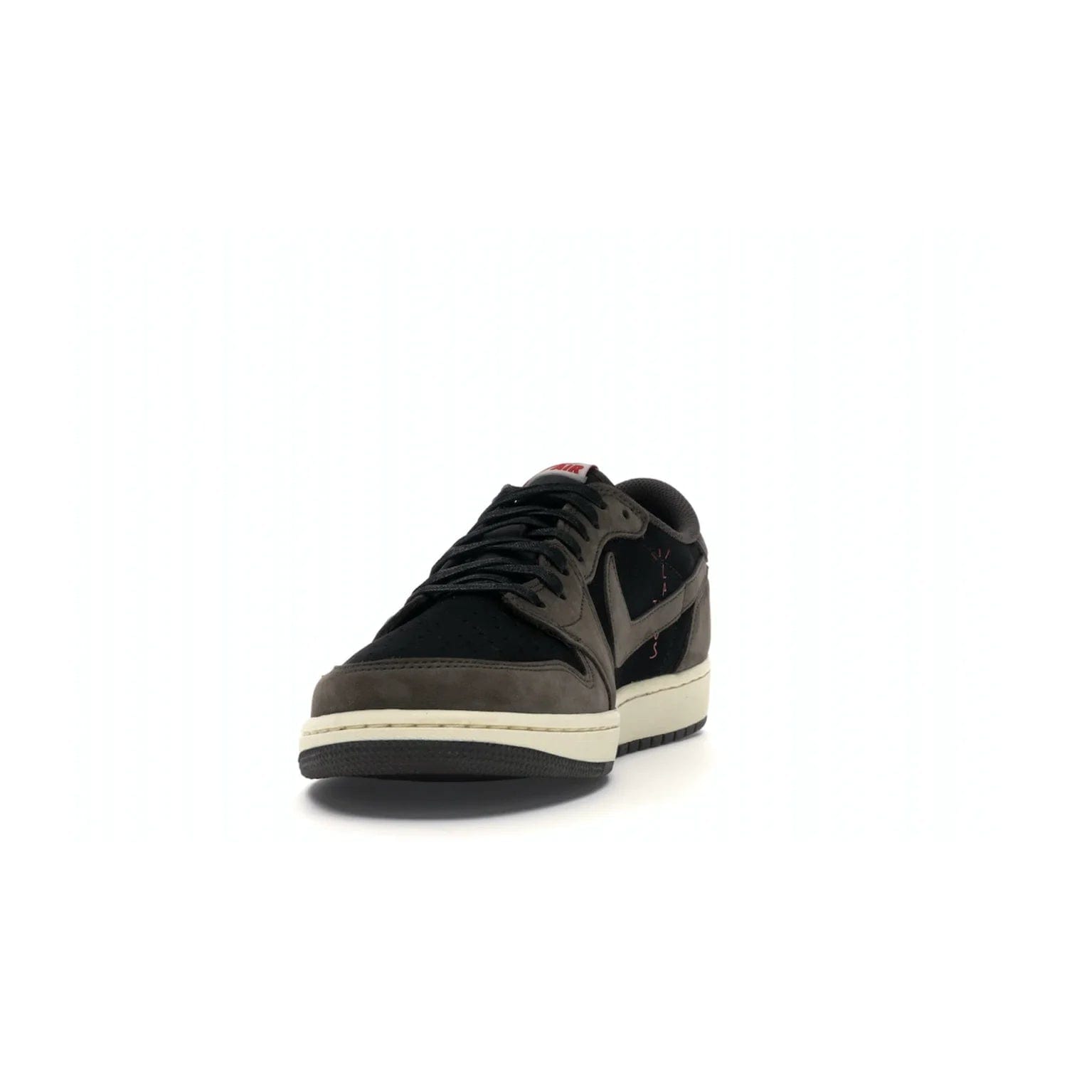 Jordan 1 Retro Low OG SP Travis Scott - Image 12 - Only at www.BallersClubKickz.com - The Air Jordan 1 Low Travis Scott combines modern and classic design elements for a stylish look. It features a black upper with dark brown overlays, red accents, sail midsole, and dark brown outsole. Signature touches include a backwards Swoosh logo and “Cactus Jack” inscriptions. Released in July 2019.