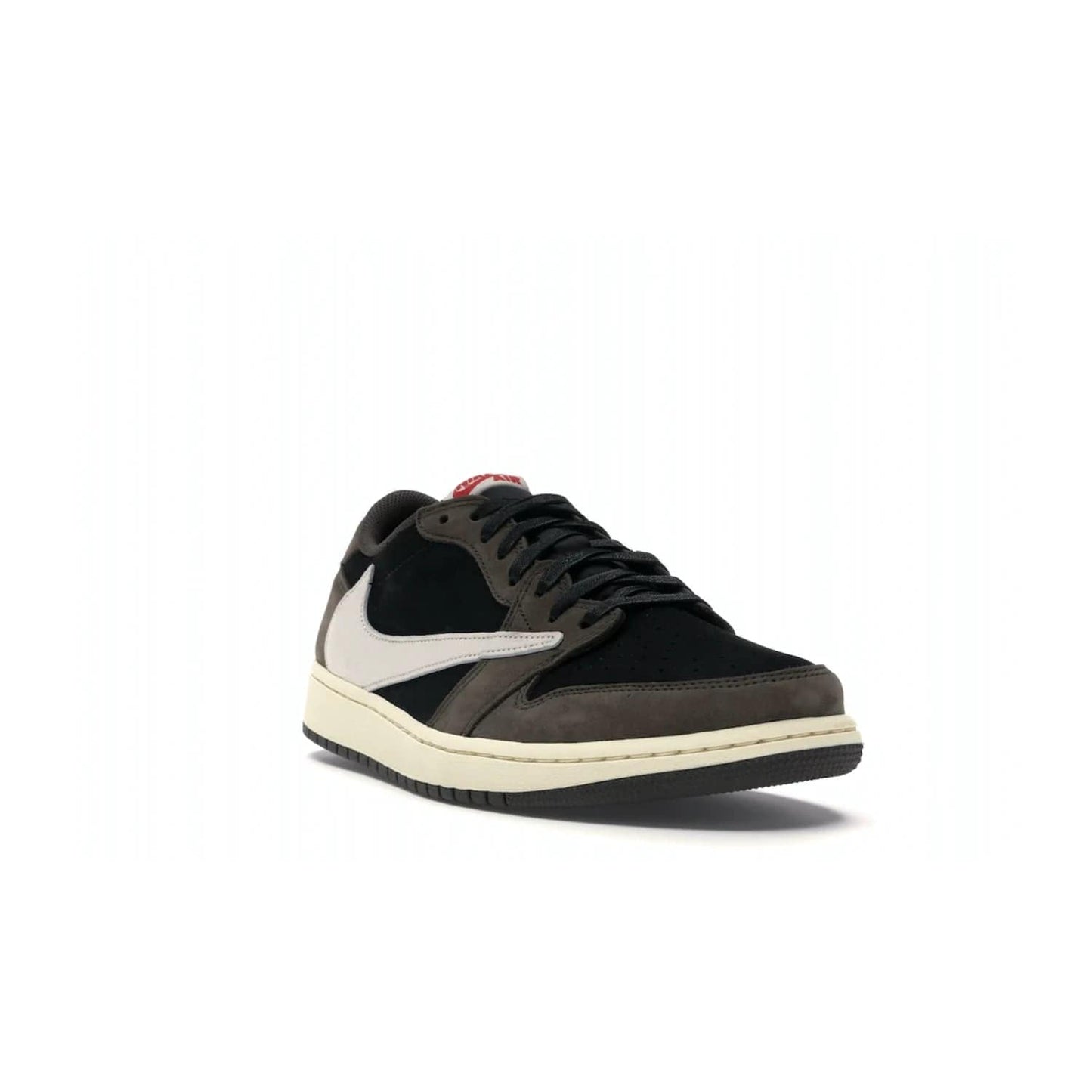Jordan 1 Retro Low OG SP Travis Scott - Image 7 - Only at www.BallersClubKickz.com - The Air Jordan 1 Low Travis Scott combines modern and classic design elements for a stylish look. It features a black upper with dark brown overlays, red accents, sail midsole, and dark brown outsole. Signature touches include a backwards Swoosh logo and “Cactus Jack” inscriptions. Released in July 2019.