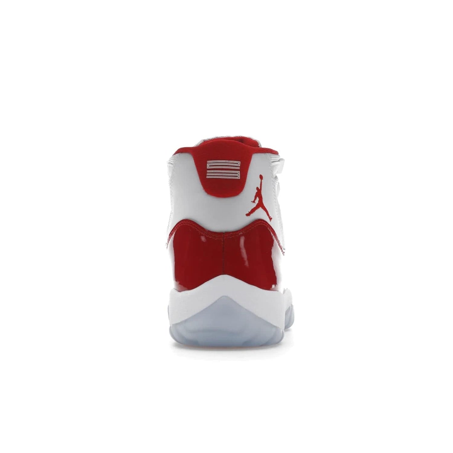 Jordan 11 Retro Cherry (2022) - Image 28 - Only at www.BallersClubKickz.com - The Air Jordan 11 Cherry features classic patent leather with Cherry red accents, icy blue outsole, and debossed 23 on the heel tab. Refresh your sneaker game with this iconic update, available December 10, 2022.