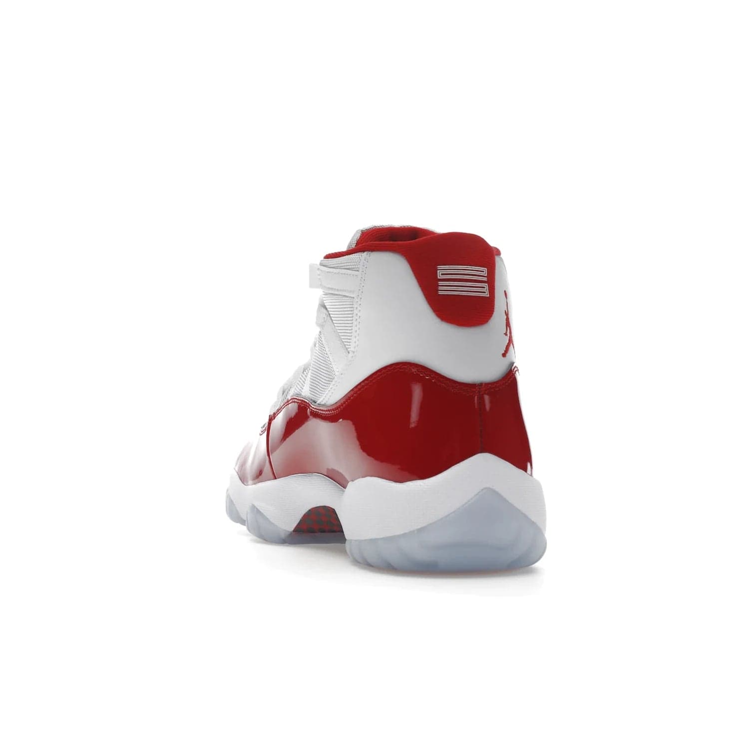 Jordan 11 Retro Cherry (2022) - Image 26 - Only at www.BallersClubKickz.com - The Air Jordan 11 Cherry features classic patent leather with Cherry red accents, icy blue outsole, and debossed 23 on the heel tab. Refresh your sneaker game with this iconic update, available December 10, 2022.
