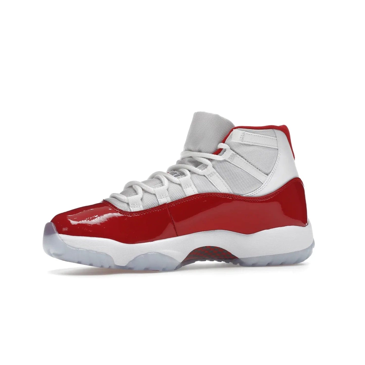 Jordan 11 Retro Cherry (2022) - Image 17 - Only at www.BallersClubKickz.com - The Air Jordan 11 Cherry features classic patent leather with Cherry red accents, icy blue outsole, and debossed 23 on the heel tab. Refresh your sneaker game with this iconic update, available December 10, 2022.