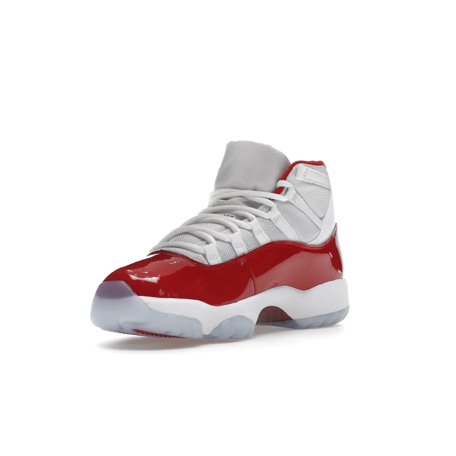 Jordan 11 Retro Cherry (2022) - Image 14 - Only at www.BallersClubKickz.com - The Air Jordan 11 Cherry features classic patent leather with Cherry red accents, icy blue outsole, and debossed 23 on the heel tab. Refresh your sneaker game with this iconic update, available December 10, 2022.