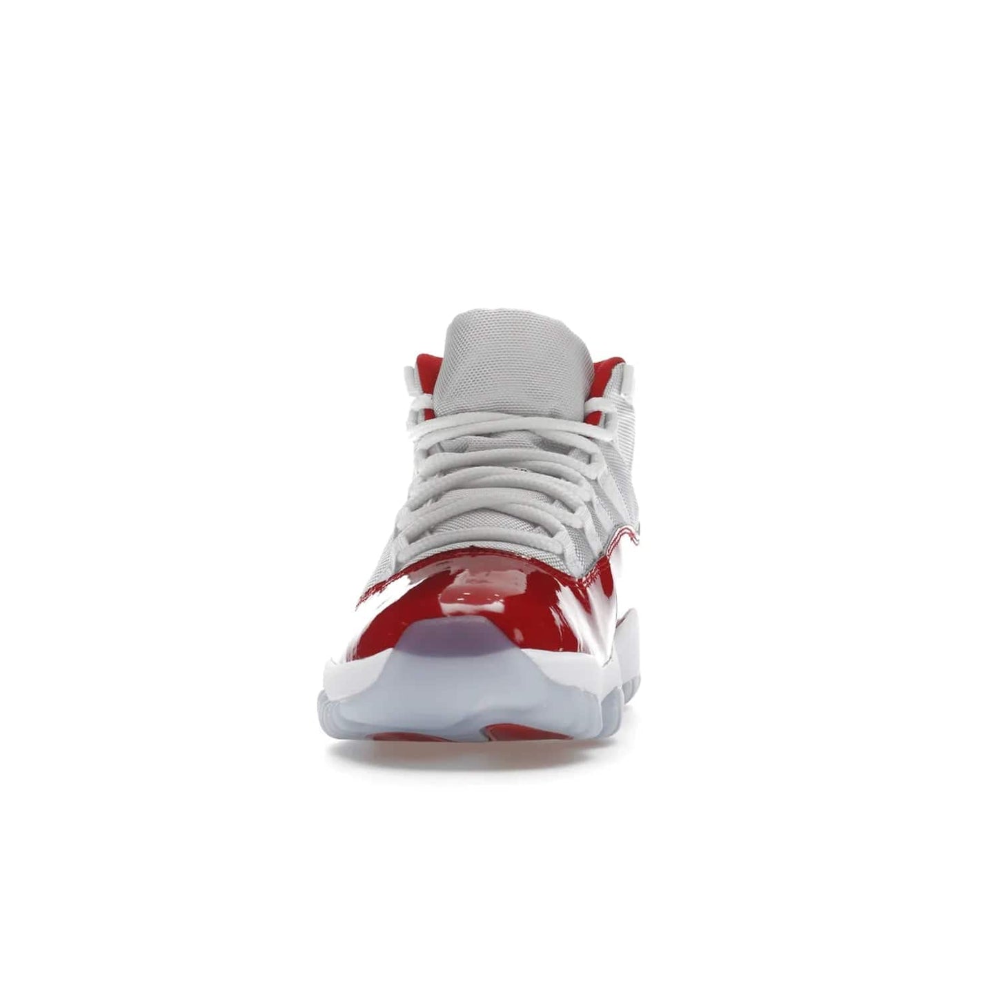 Jordan 11 Retro Cherry (2022) - Image 11 - Only at www.BallersClubKickz.com - The Air Jordan 11 Cherry features classic patent leather with Cherry red accents, icy blue outsole, and debossed 23 on the heel tab. Refresh your sneaker game with this iconic update, available December 10, 2022.